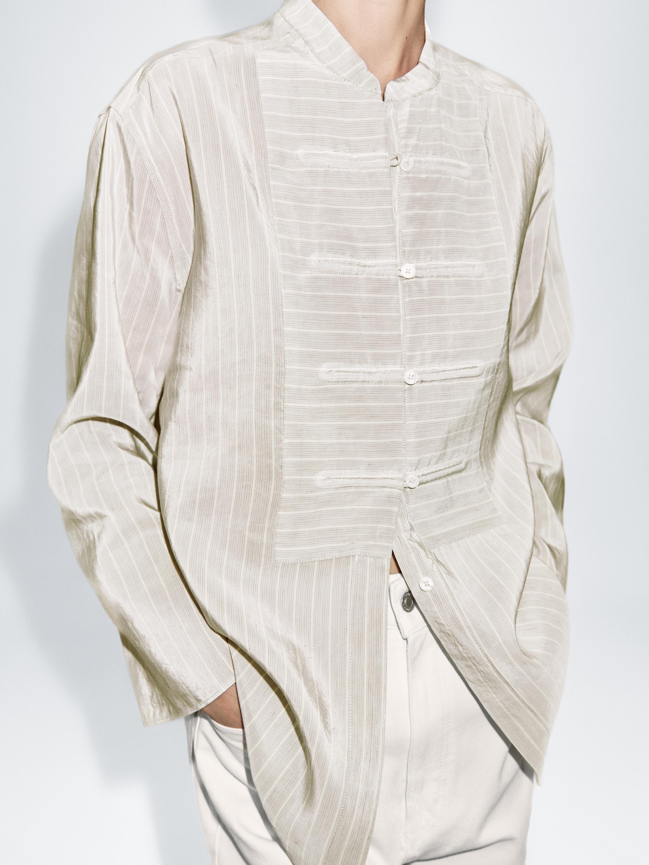Striped oversize blouse with stand collar