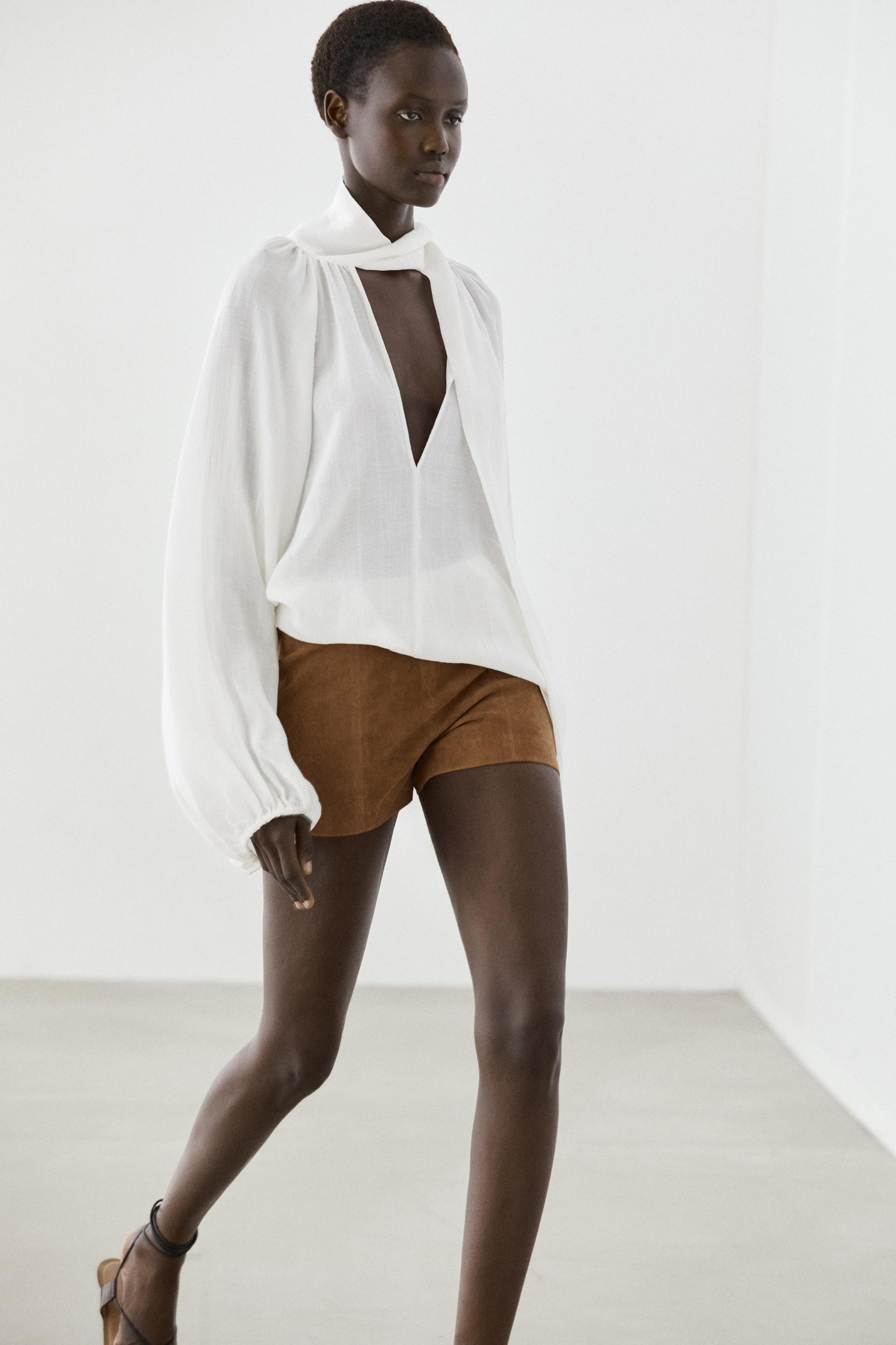 Flowing V-neck blouse with tie — WHITE