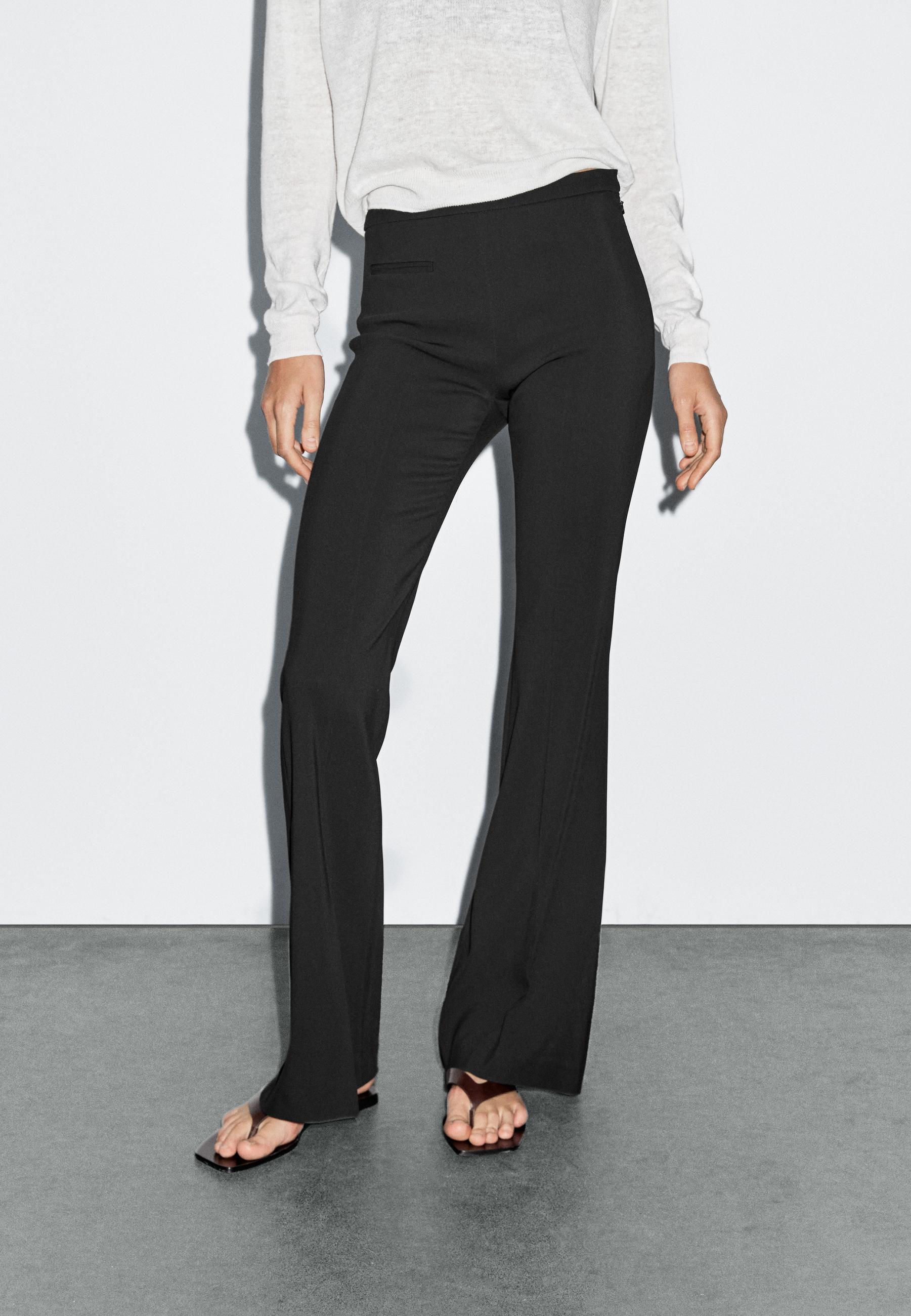 Flared trousers with pocket — BLACK