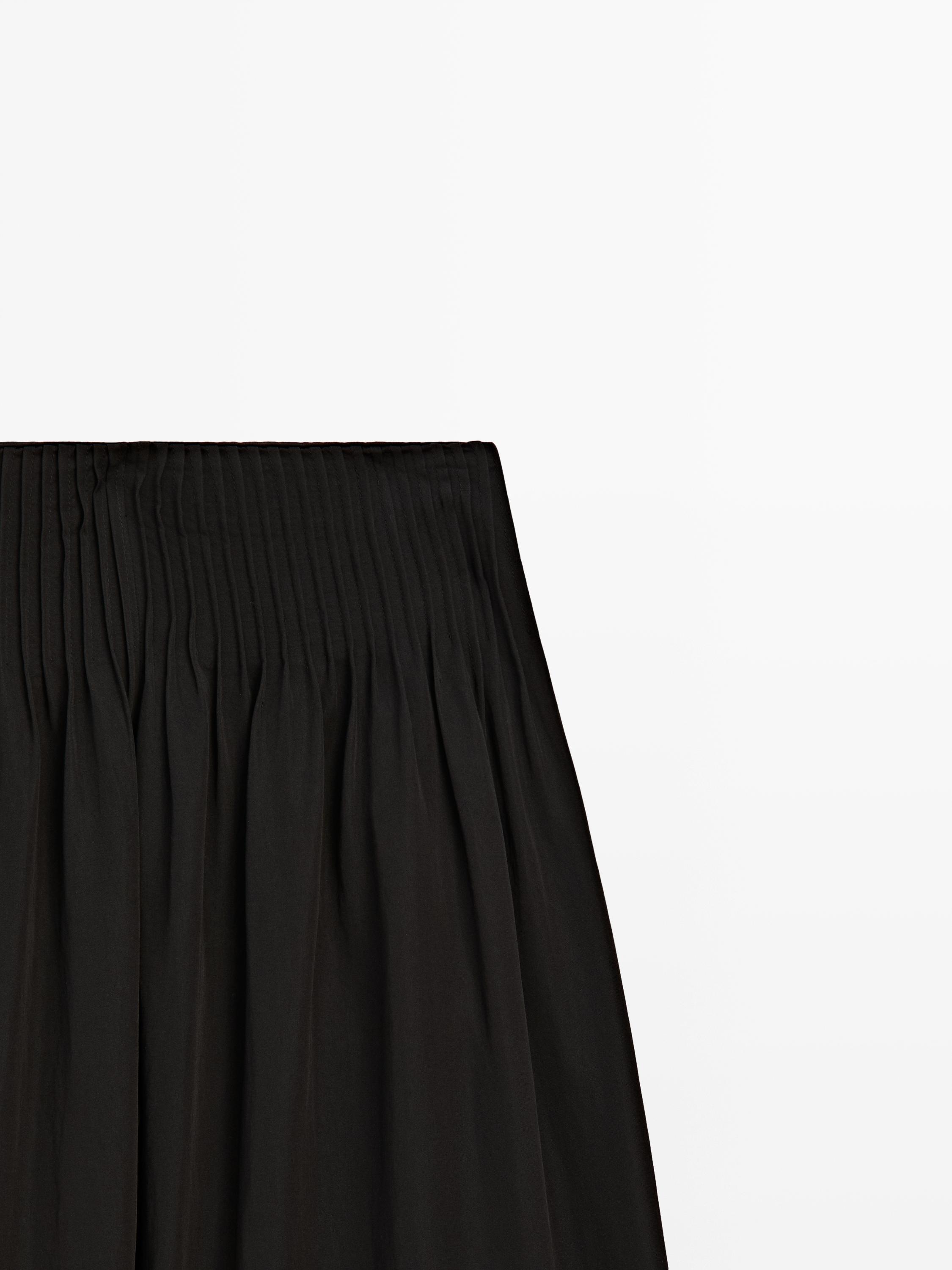 Flowing wide-leg pants — BLACK