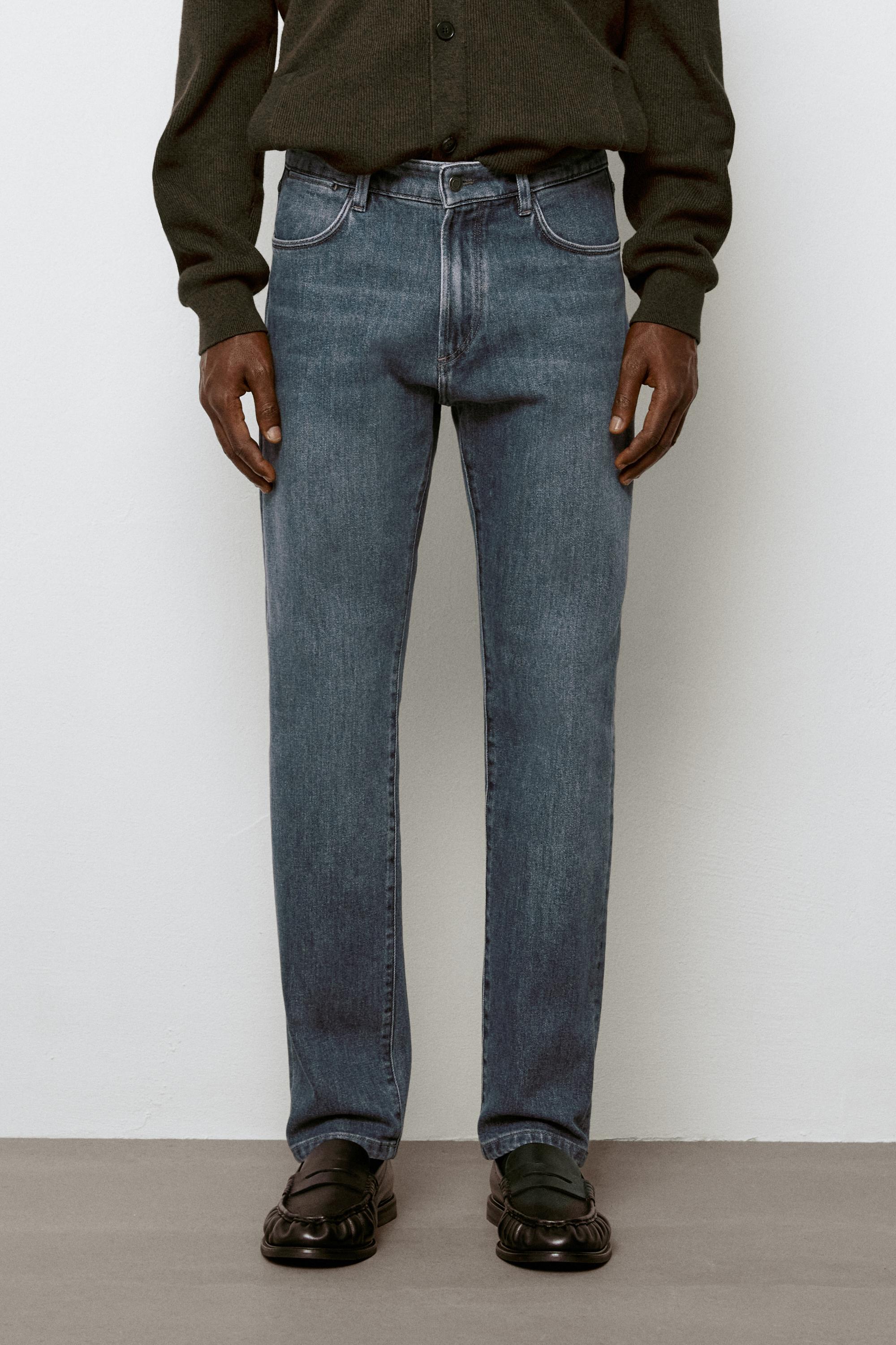 Enzymatic tapered fit jeans
