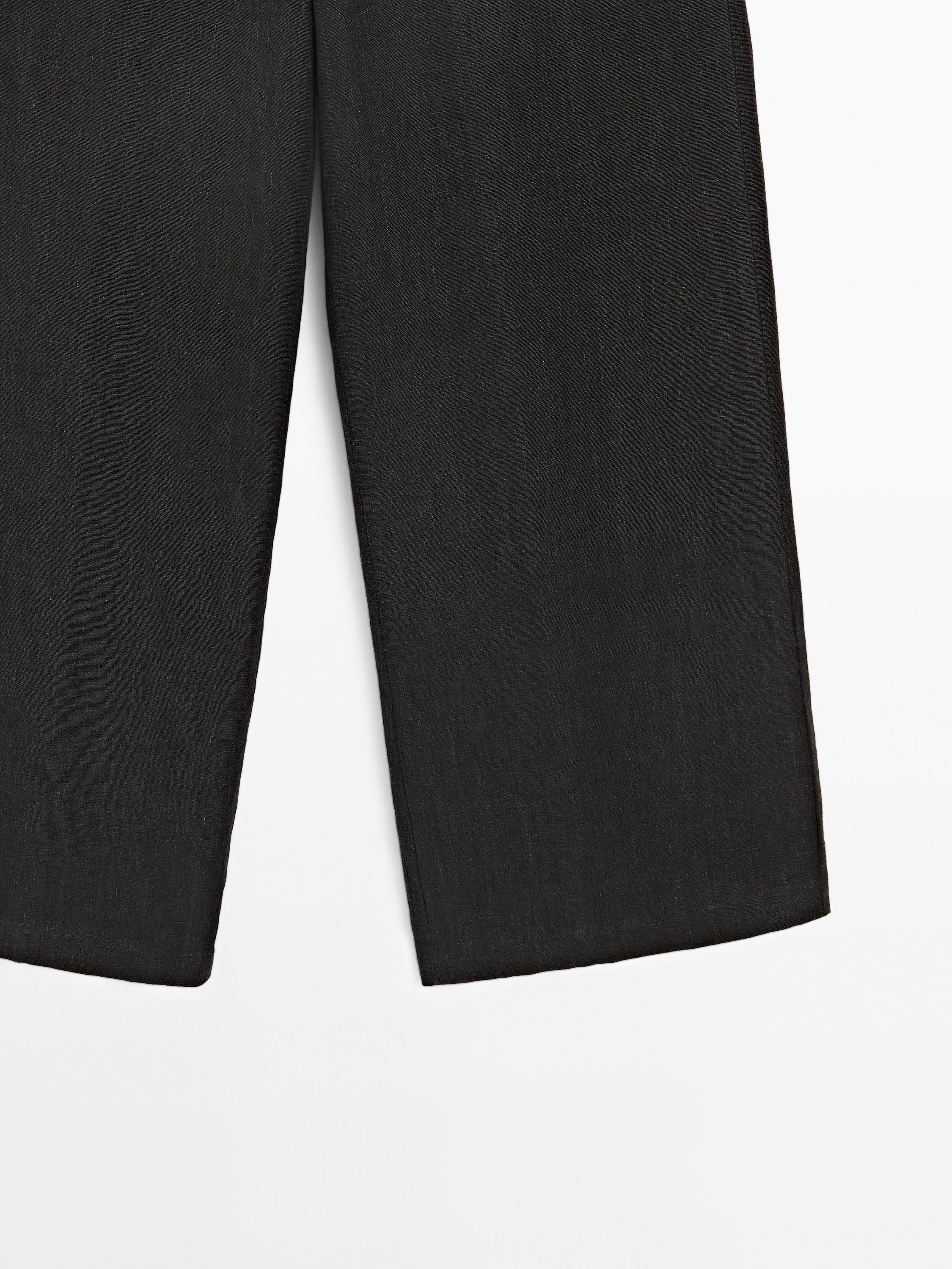 Linen suit trousers with frayed detail