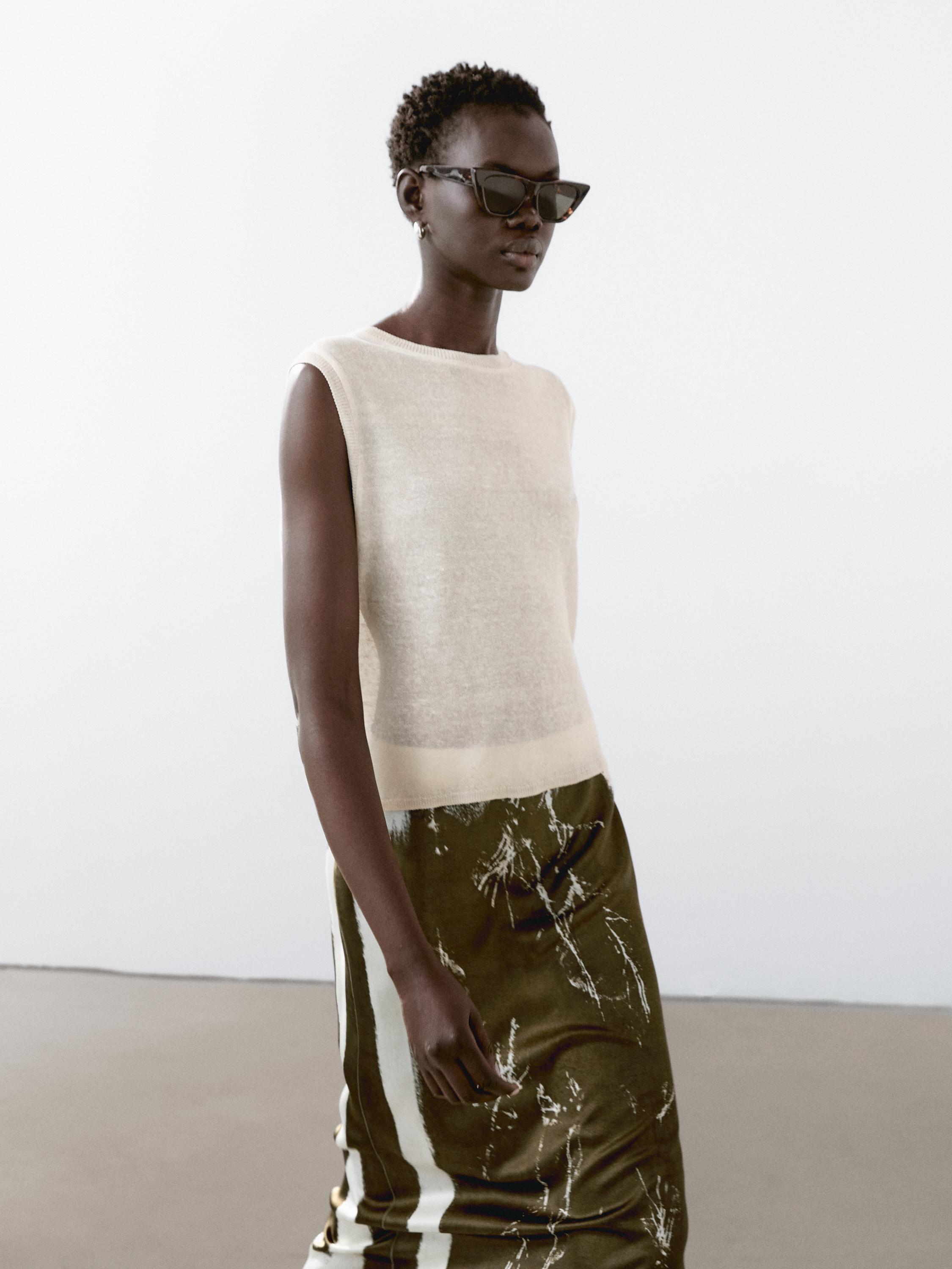 Sleeveless top in flowing fabric
