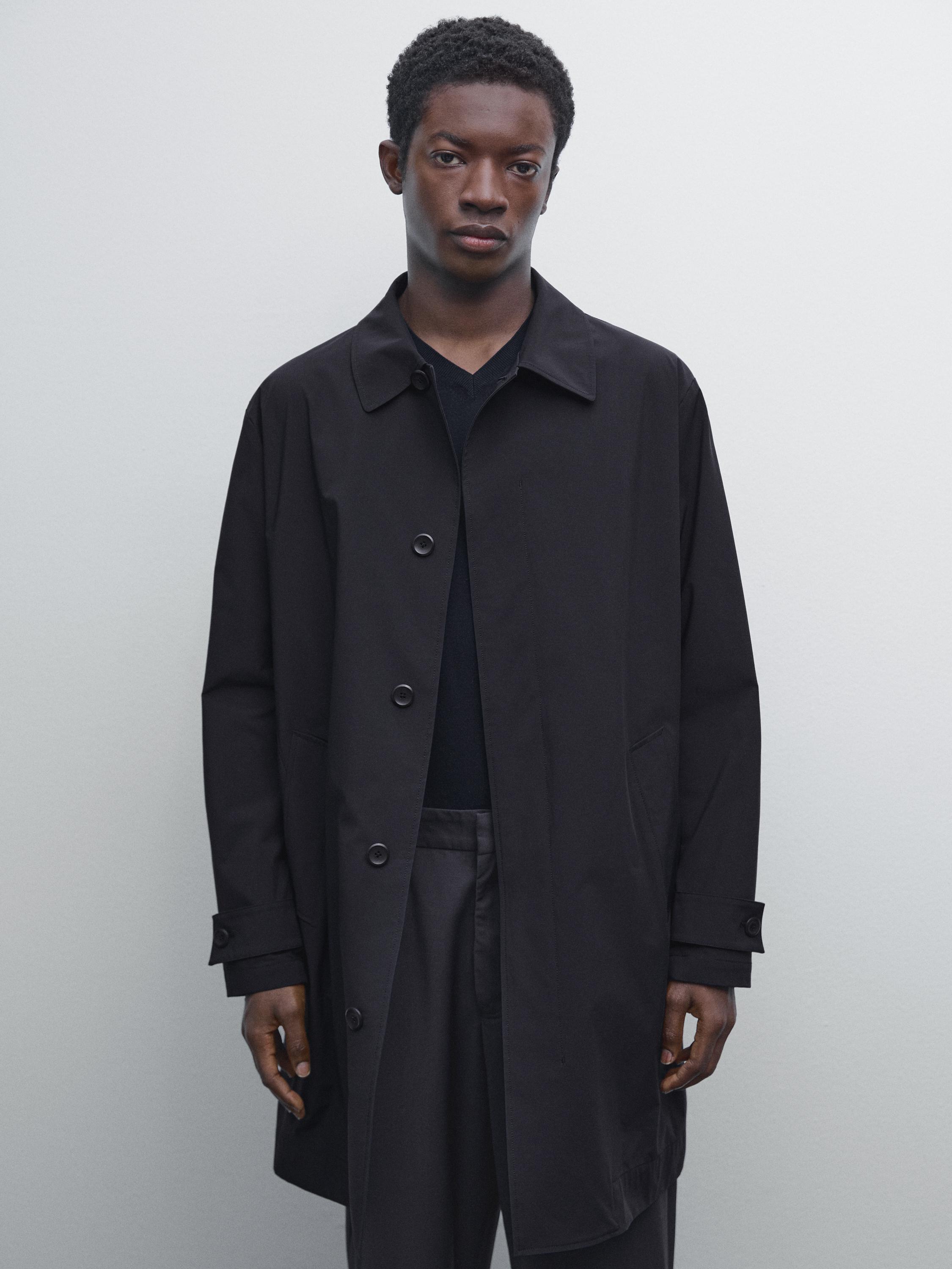 Lightweight trench coat with hidden buttons