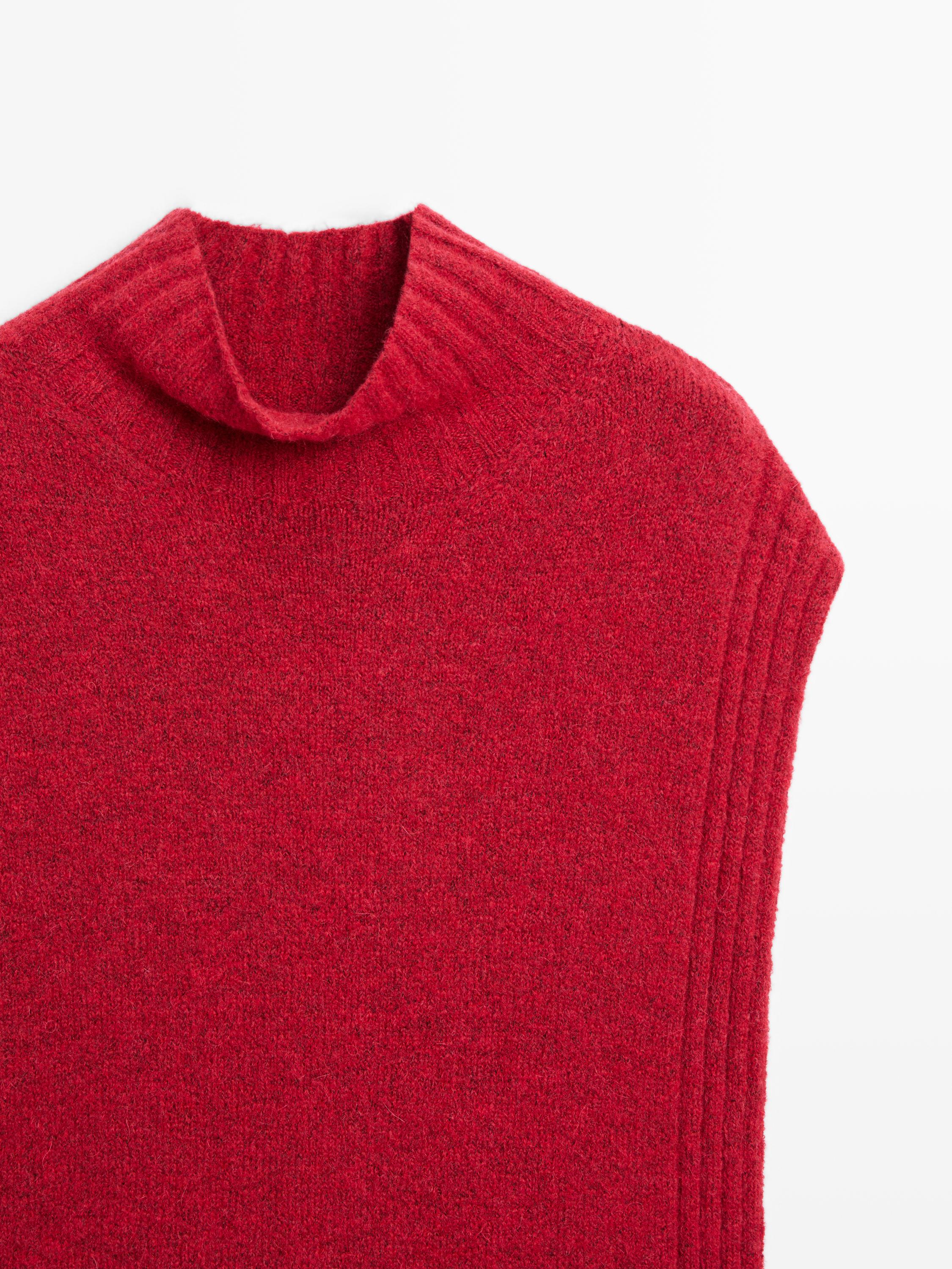 Sleeveless high neck sweater
