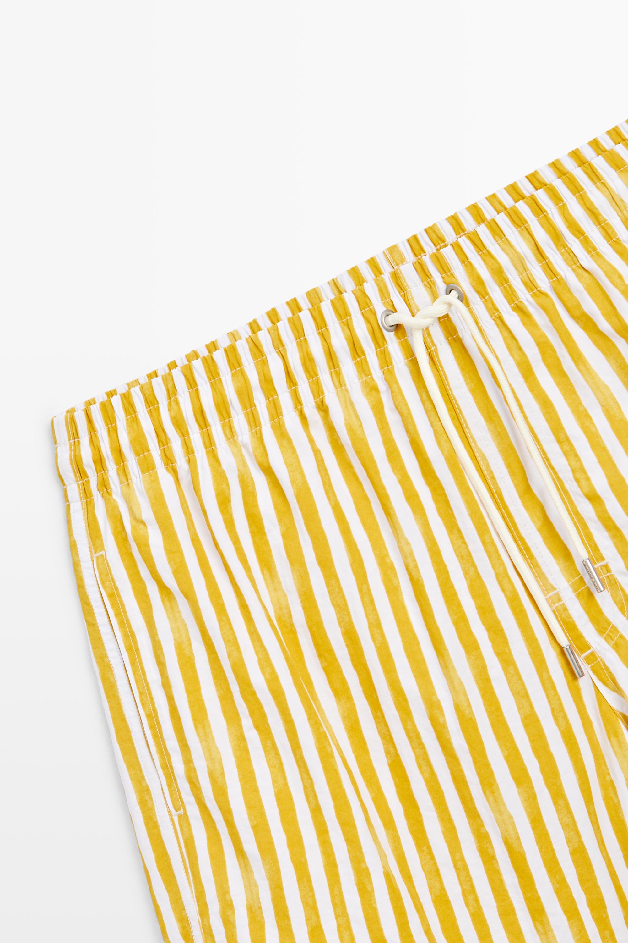 Striped printed swimming trunks — YELLOW