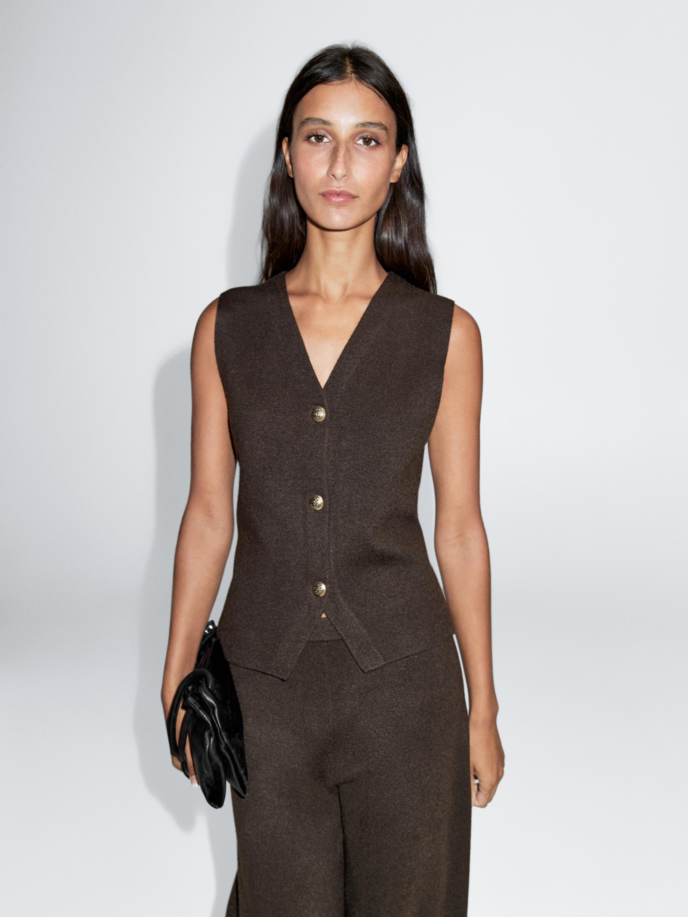 Knit vest with golden buttons