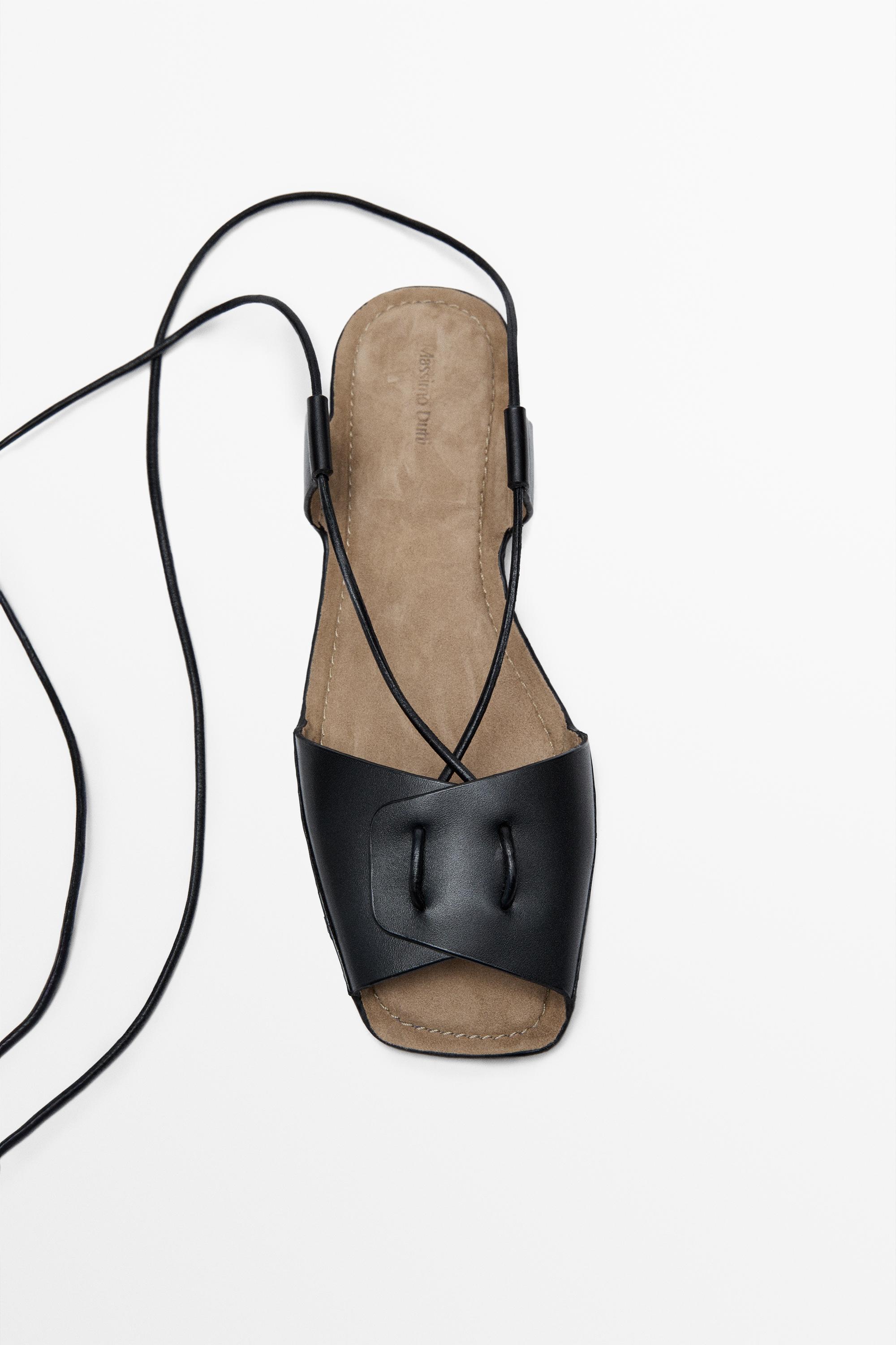 Flat leather strappy sandals