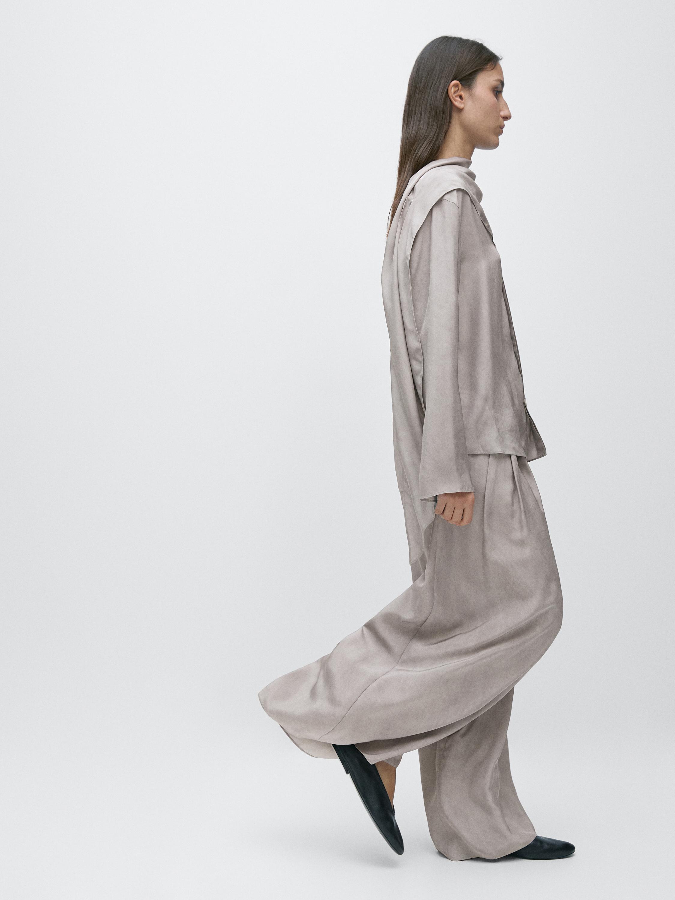 Dökümlü geniş paça pensli pantolon