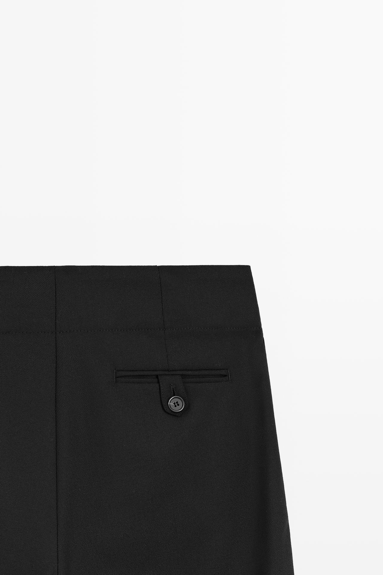 Cargo pants with hem button detail — BLACK