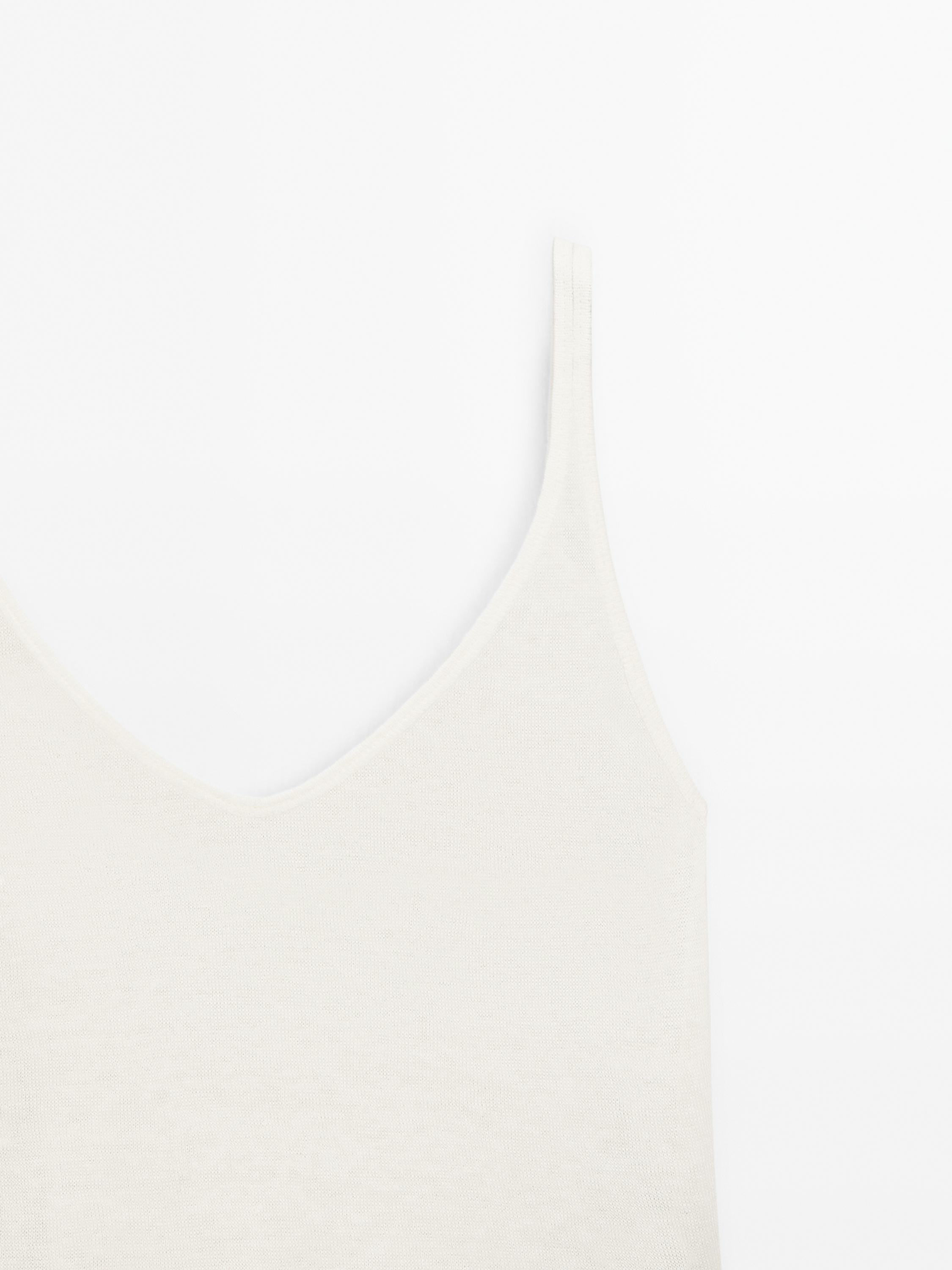 100% linen top with ruffled hem