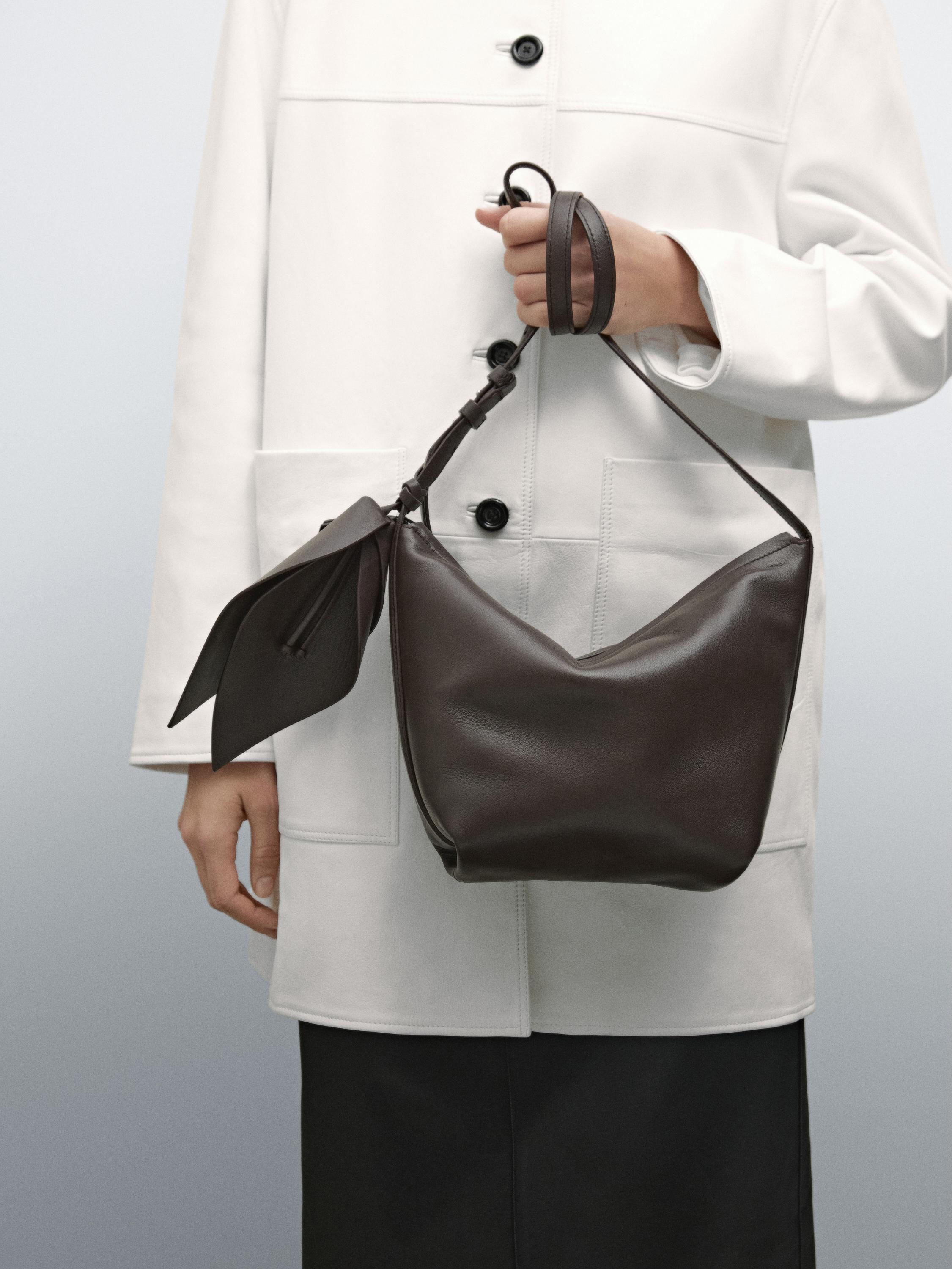 Nappa leather crossbody bag with flower detail