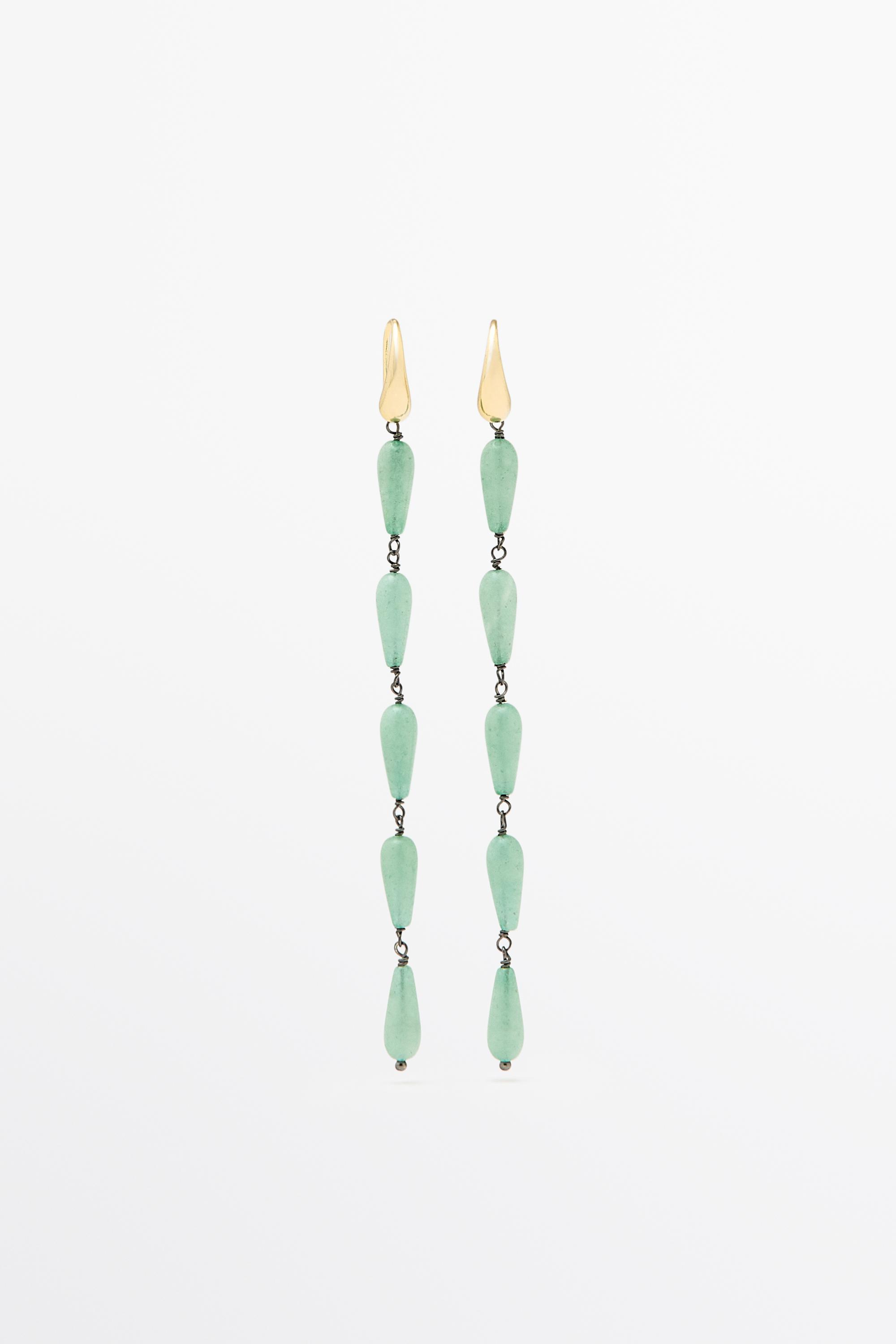 Boucles d’oreilles pendantes ornées de gemmes