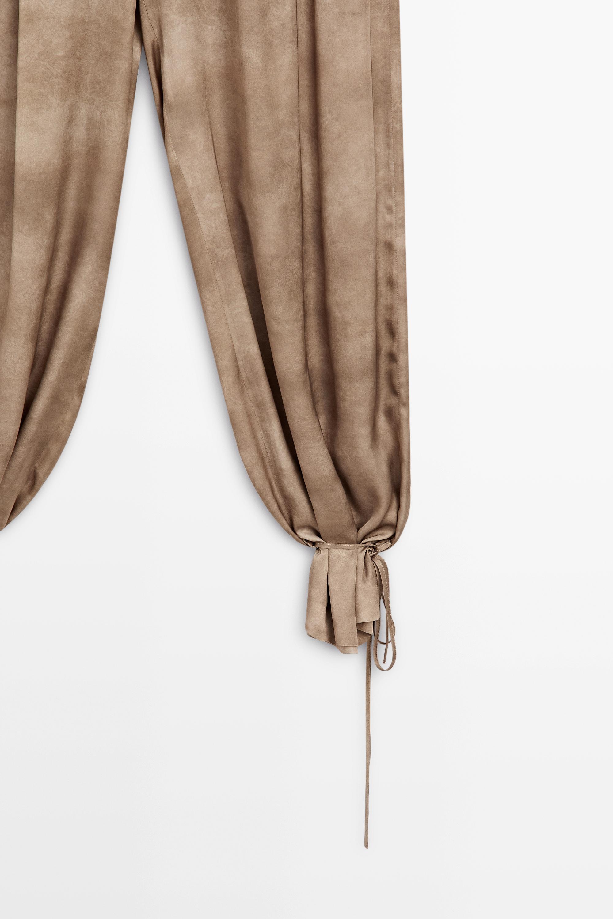 Flowing pants with tie-detail hem — BEIGE