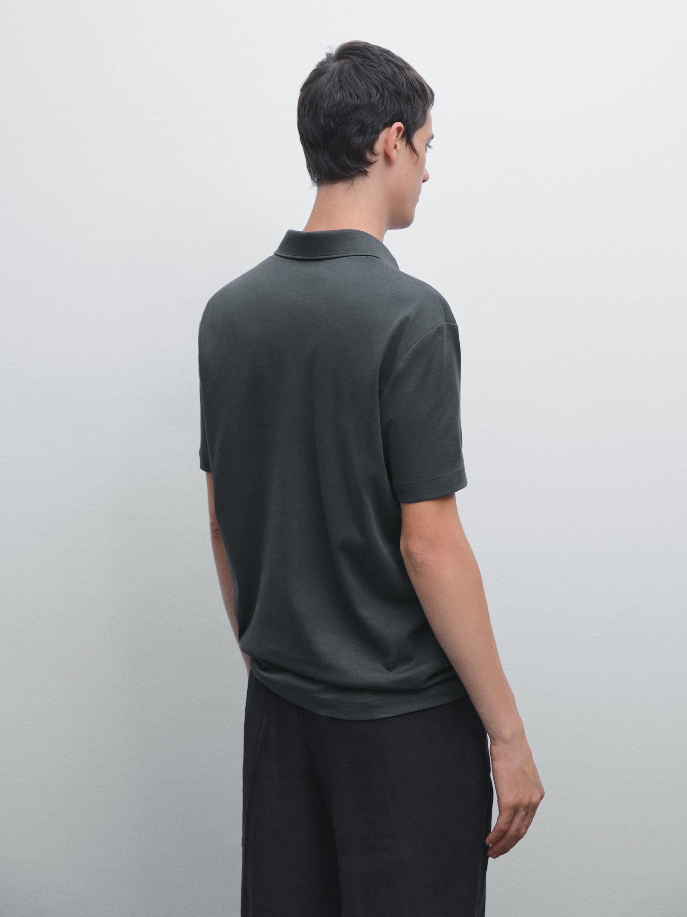 Short sleeve polo shirt with snap-button placket