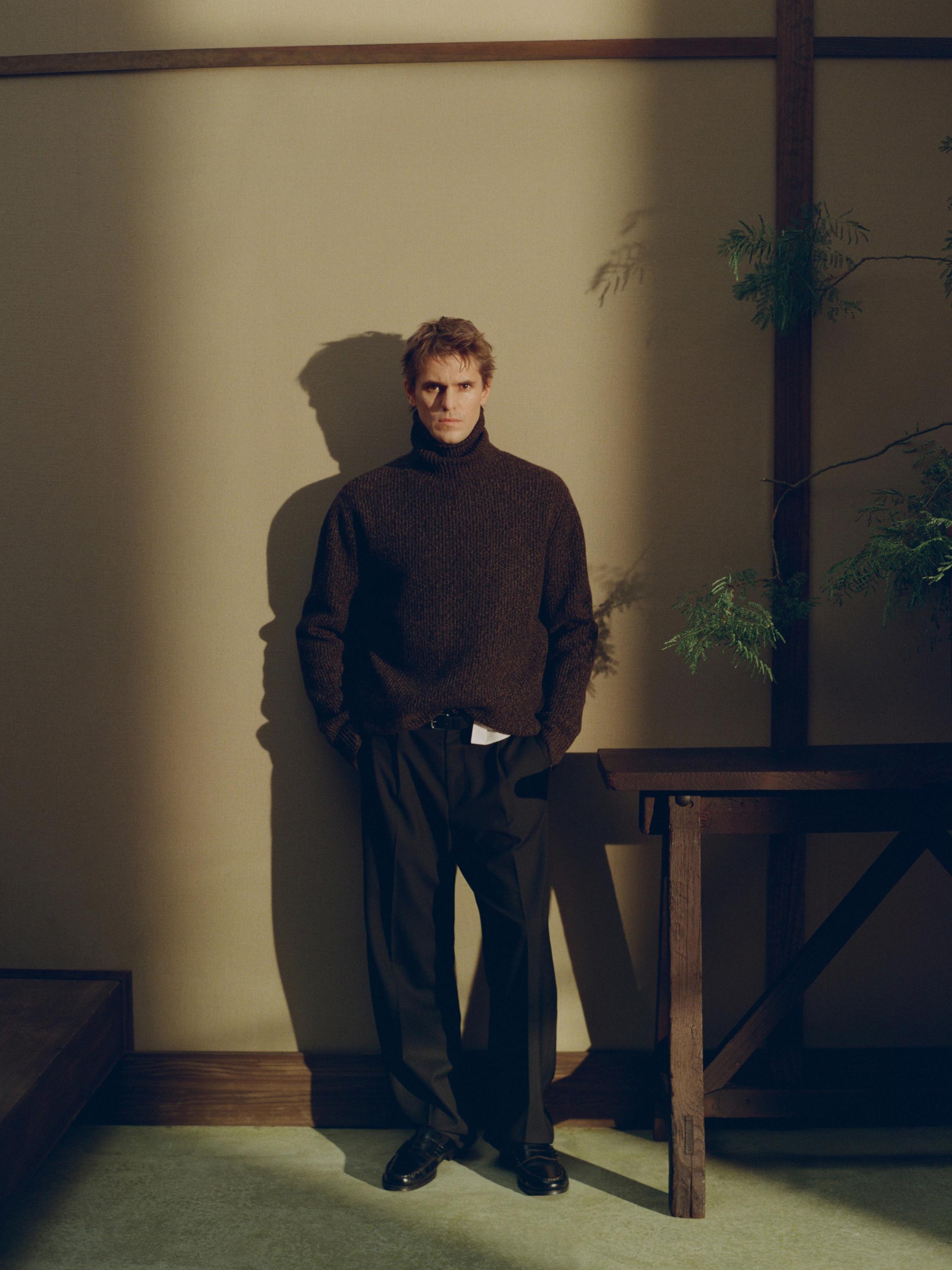 100% wool mouliné knit sweater with high neck