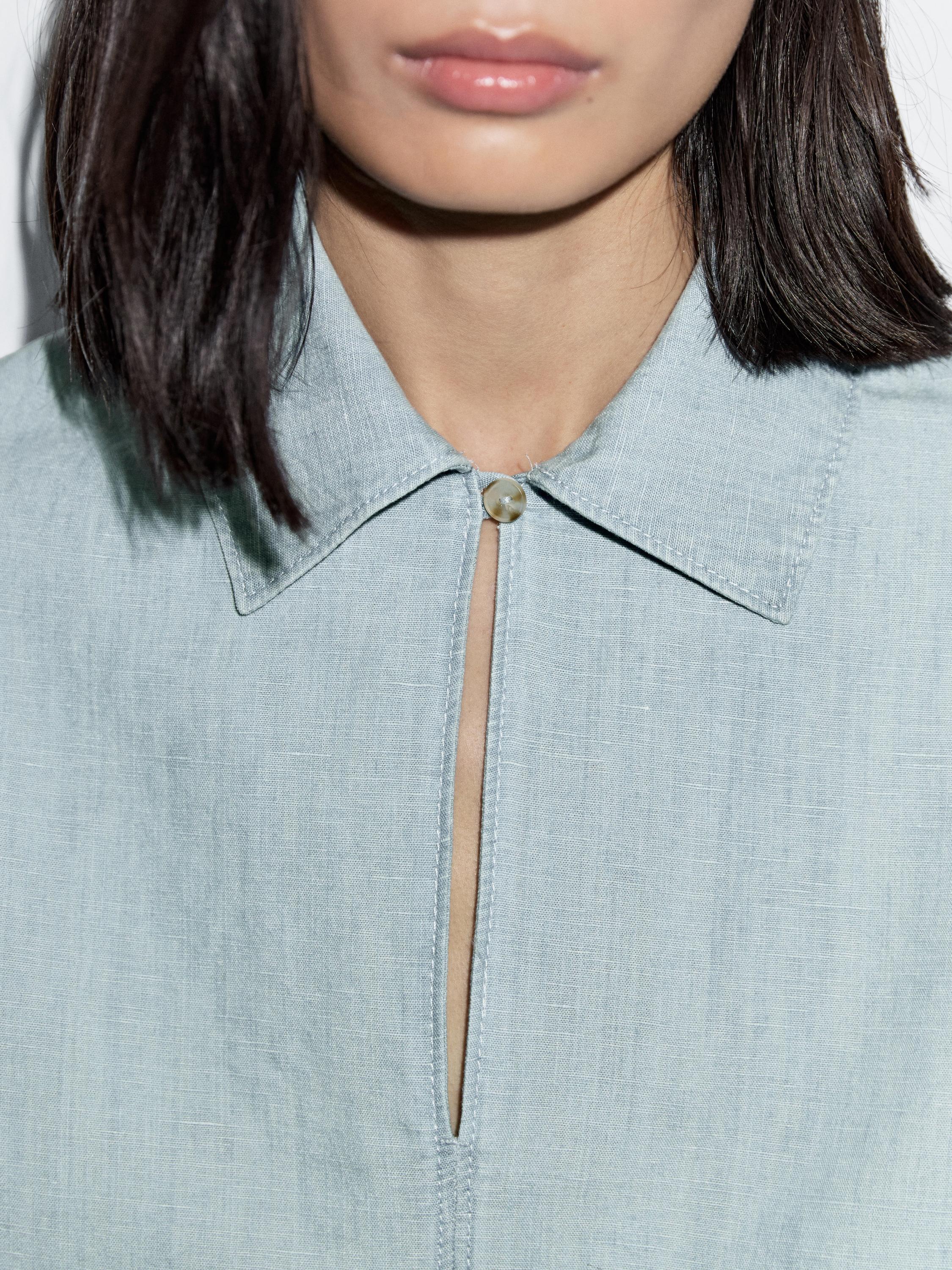 Oversize denim blouse with puff sleeves