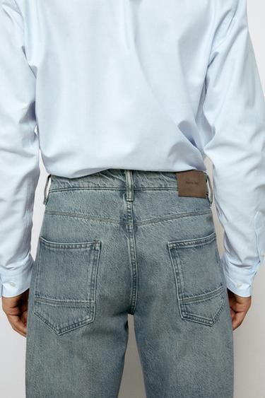 Stonewashed tapered-fit jeans — BLUE 10