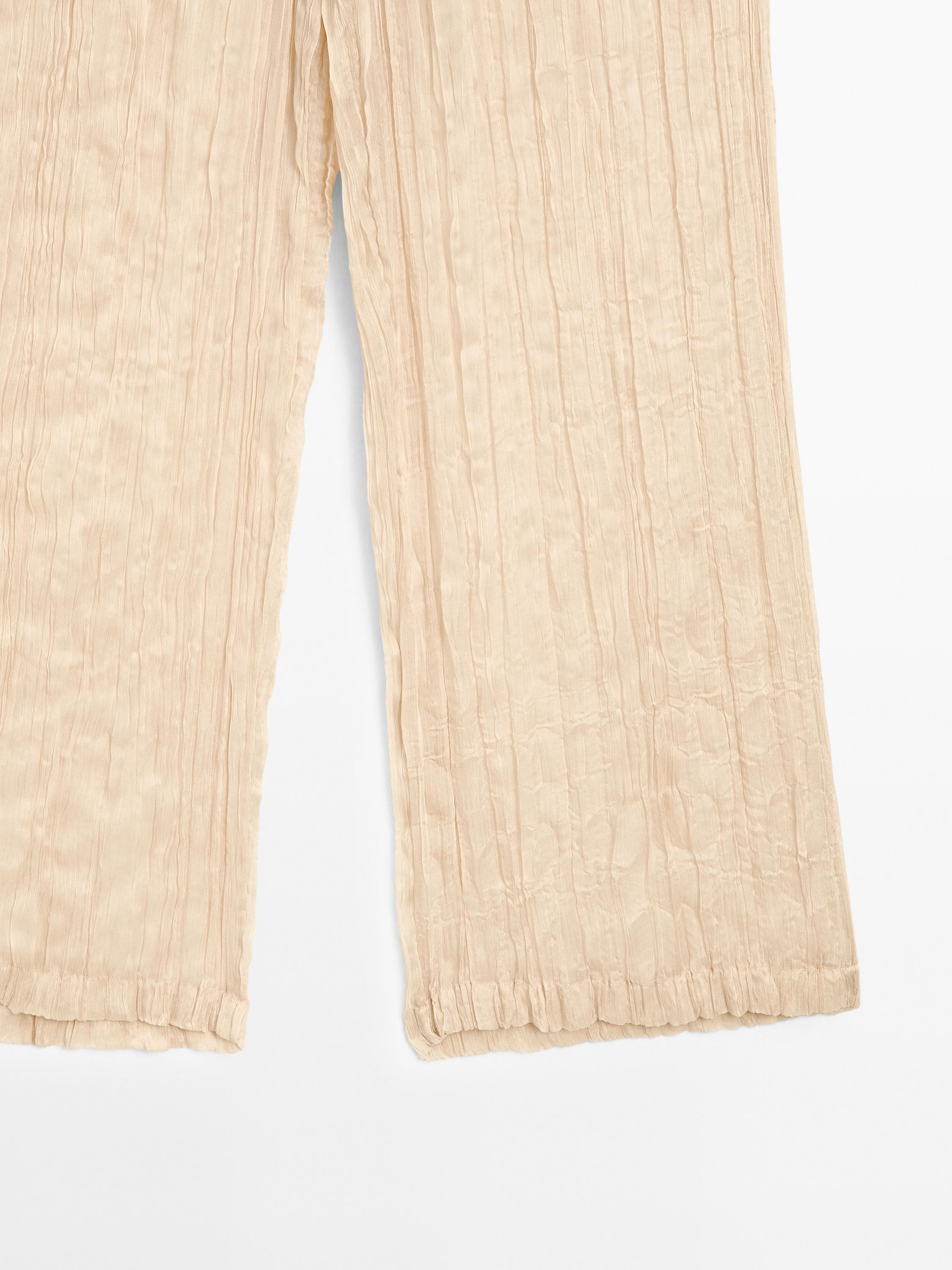 Flowing pleated trousers - Limited Edition