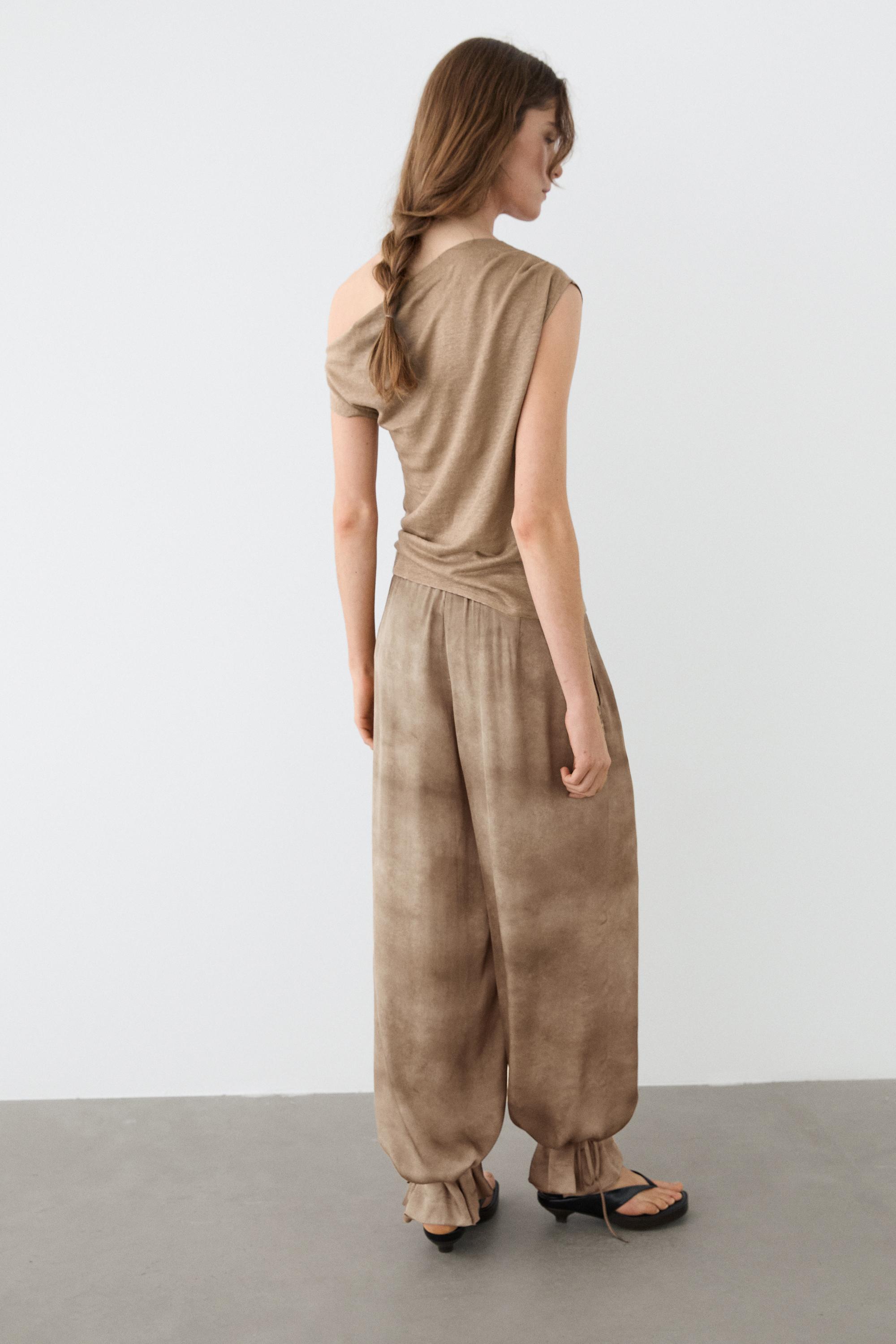 Flowing pants with tie-detail hem — BEIGE