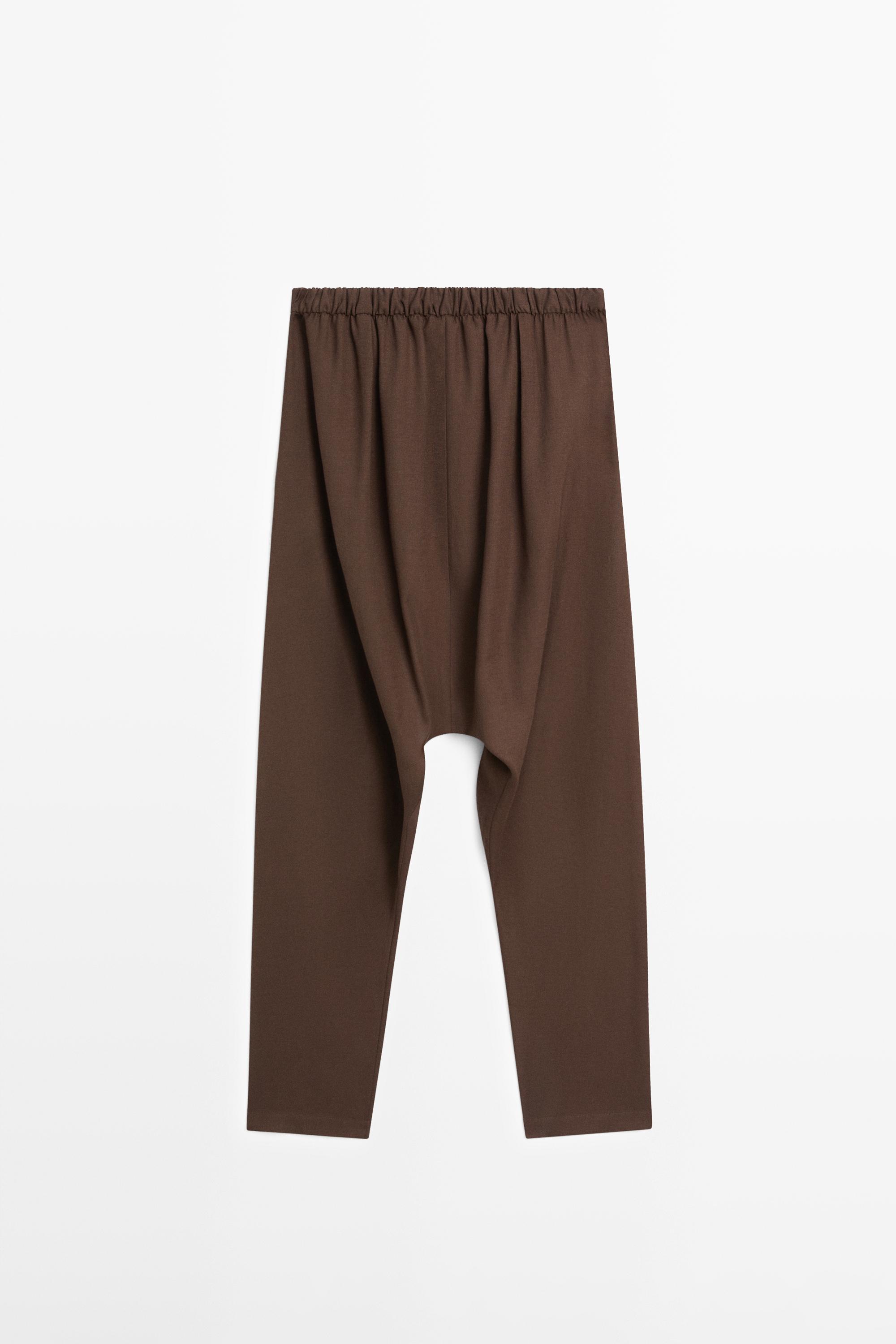 Baggy trousers with pleated details — BROWN