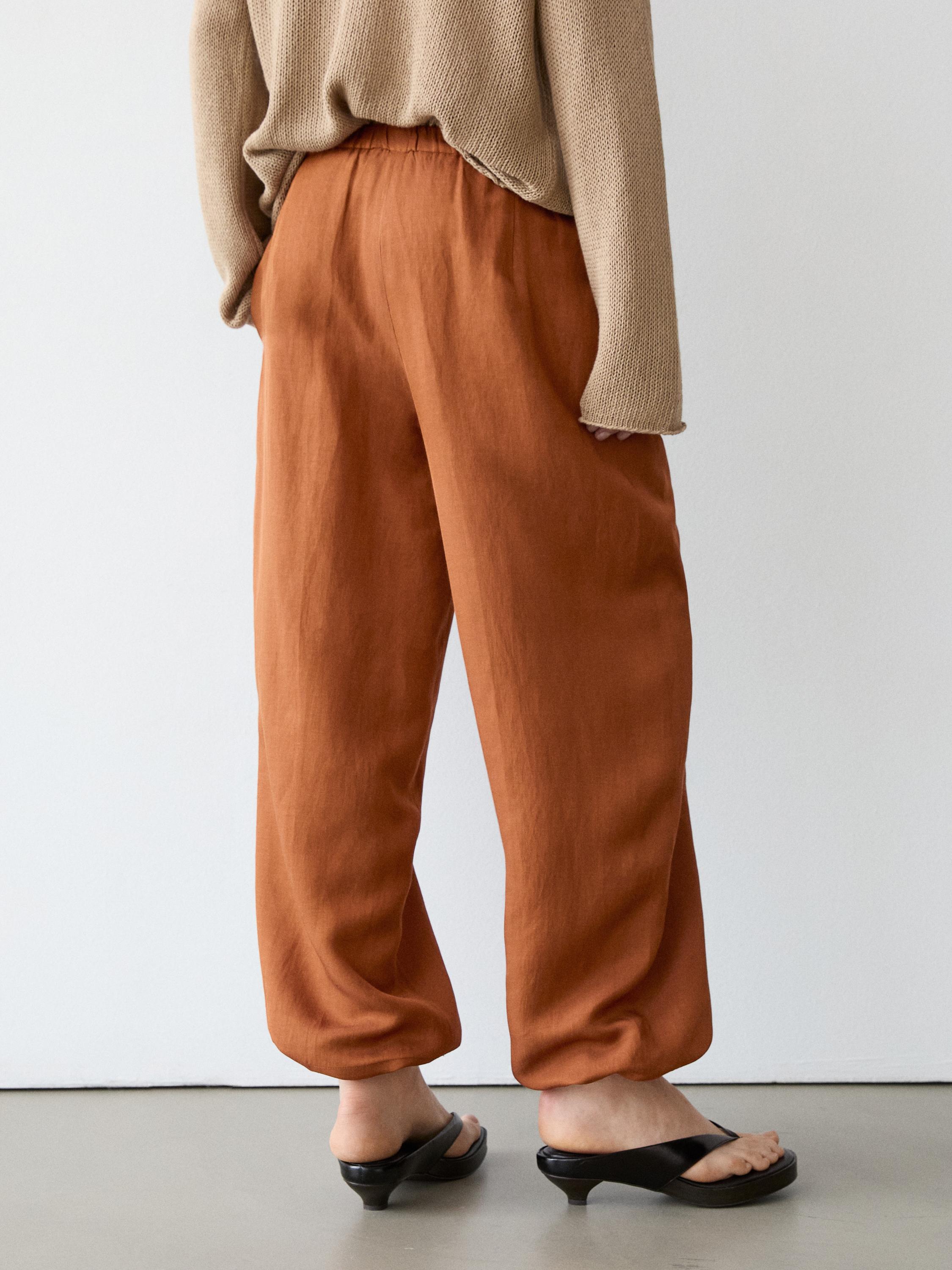 Flowing trousers with tie detail — ORANGE