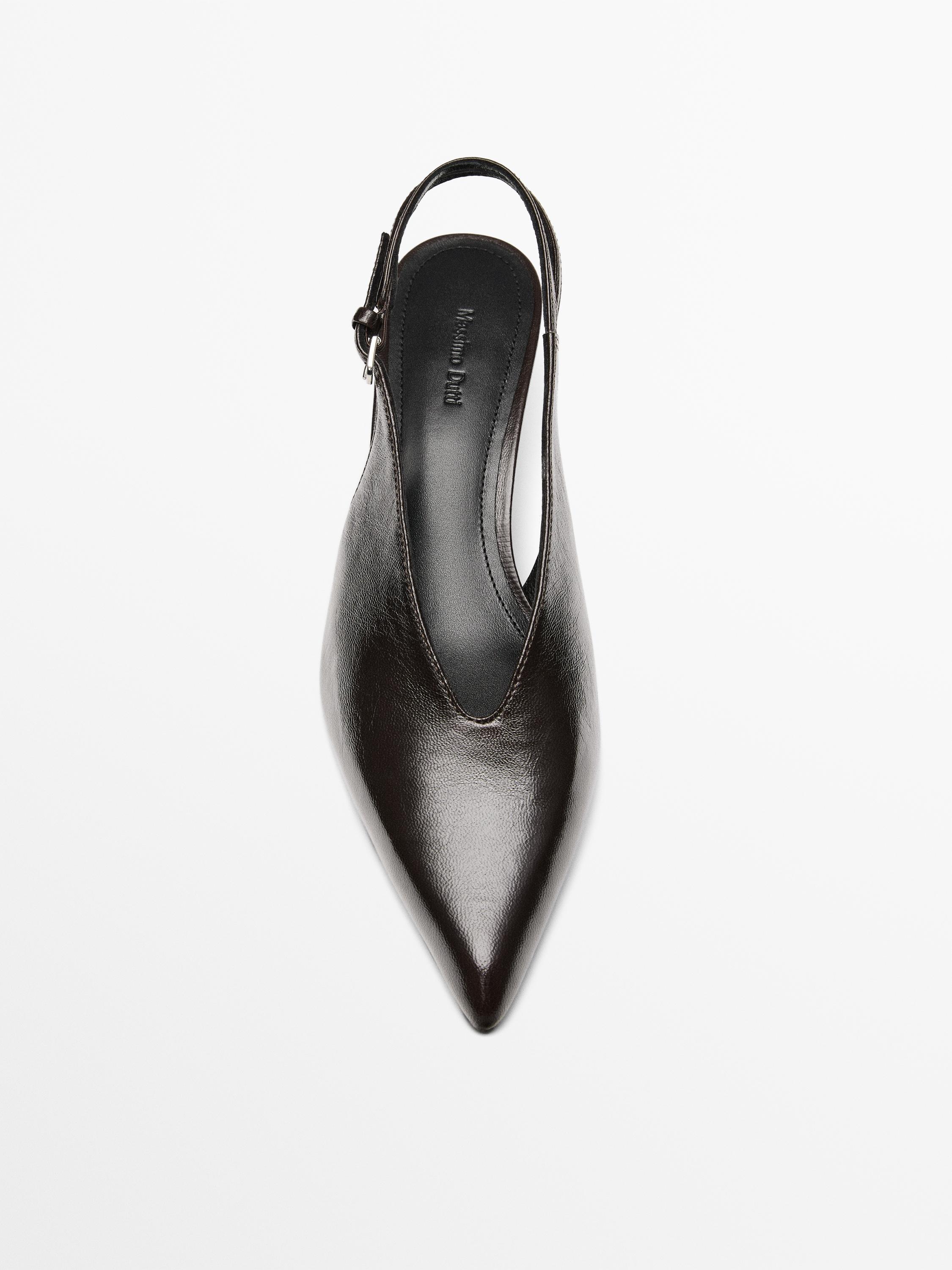 حذاء جلد بكعب عالٍ