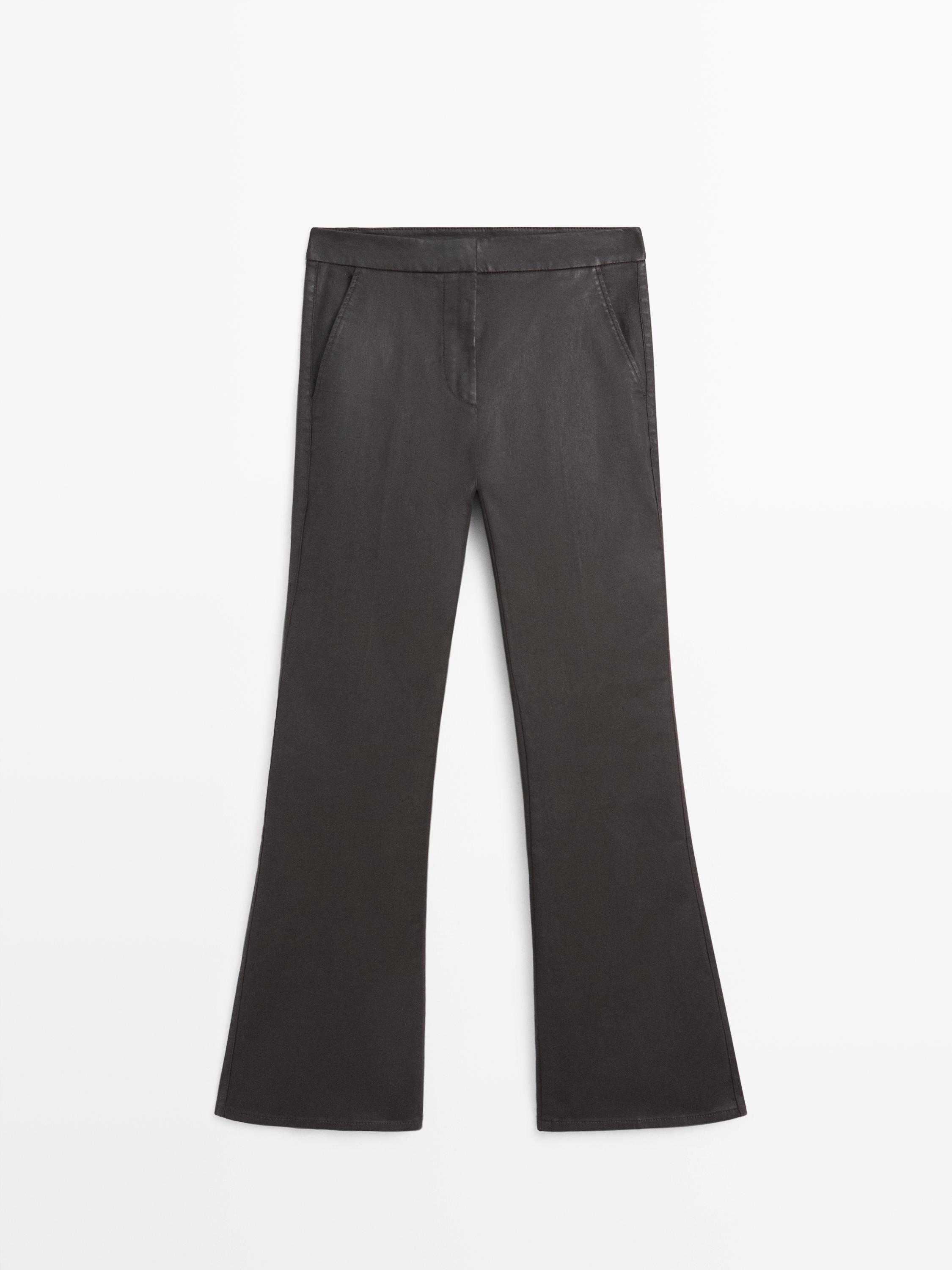 Coated flared trousers