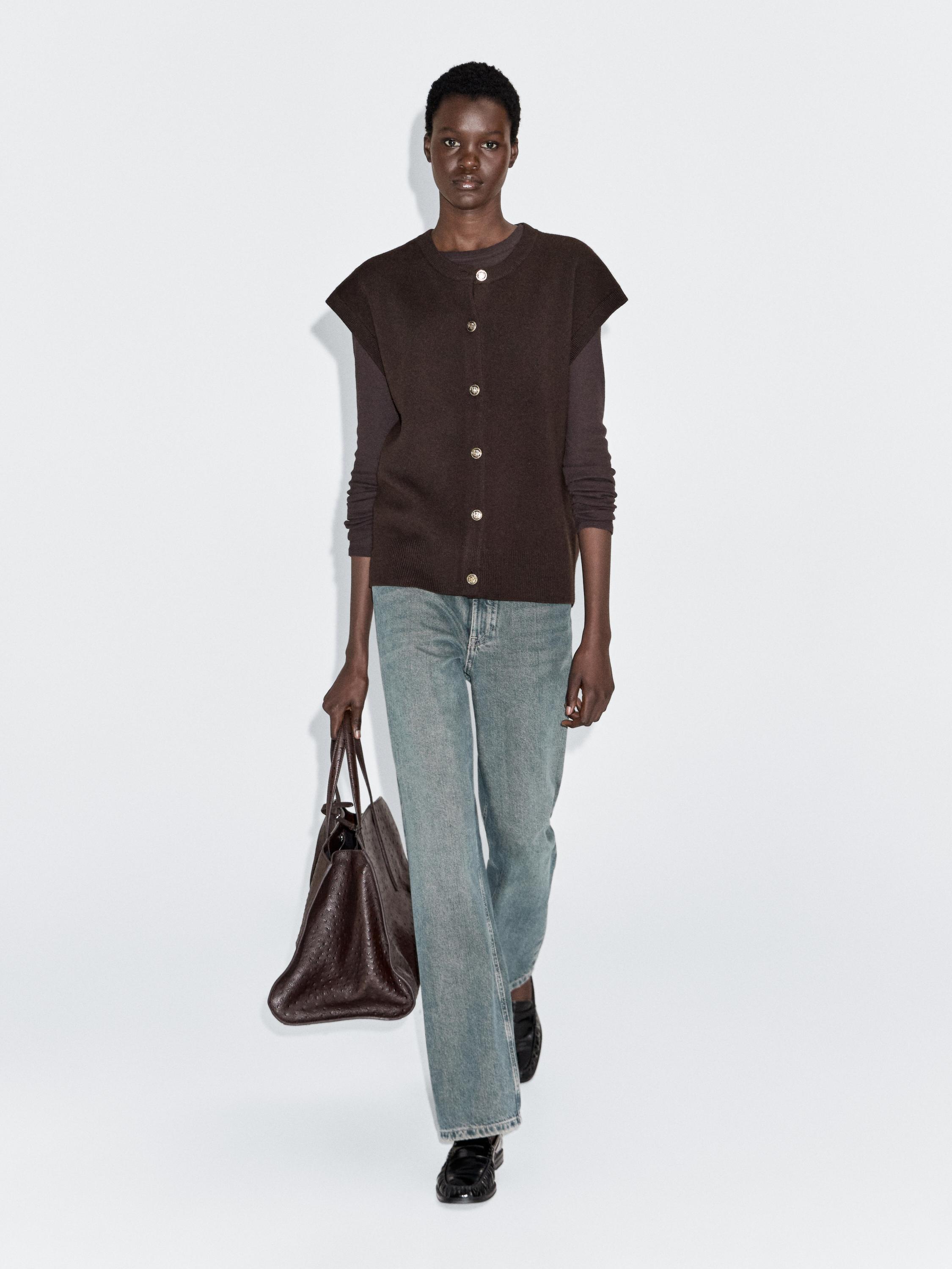 Knit vest with golden buttons