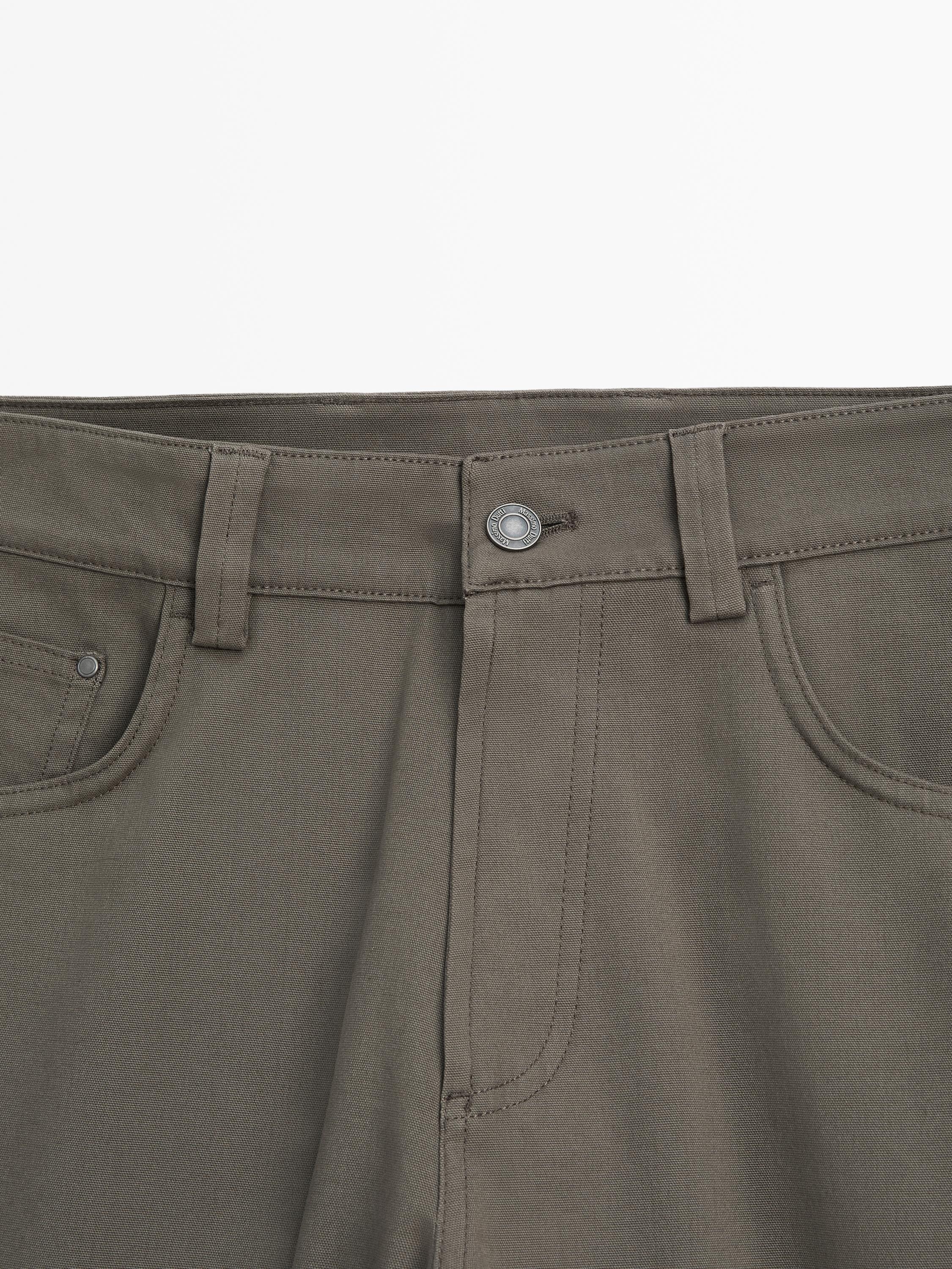Cotton blend tapered fit jeans