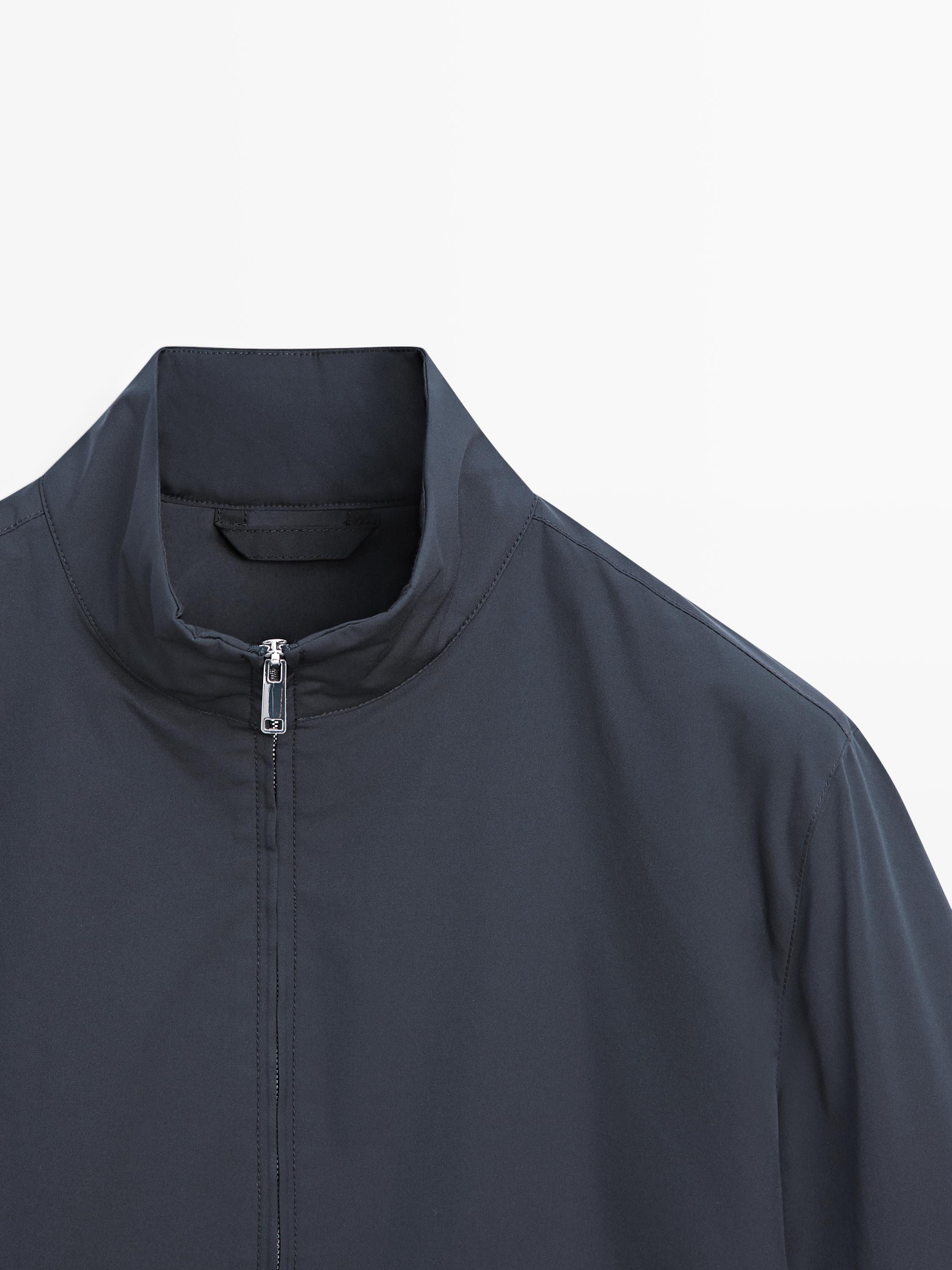 Water-repellent puffer jacket with high neck — DARK NAVY