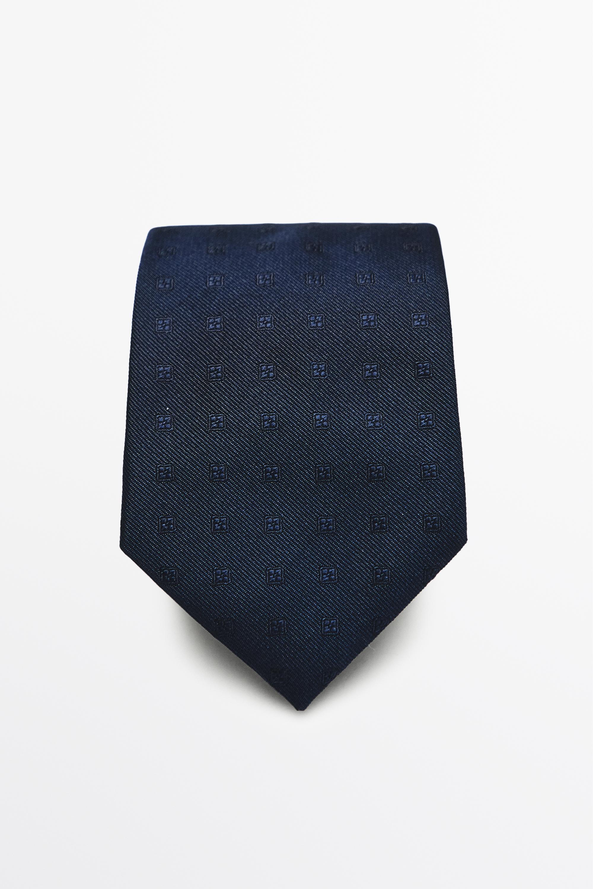 100% silk tie with embroidered detail