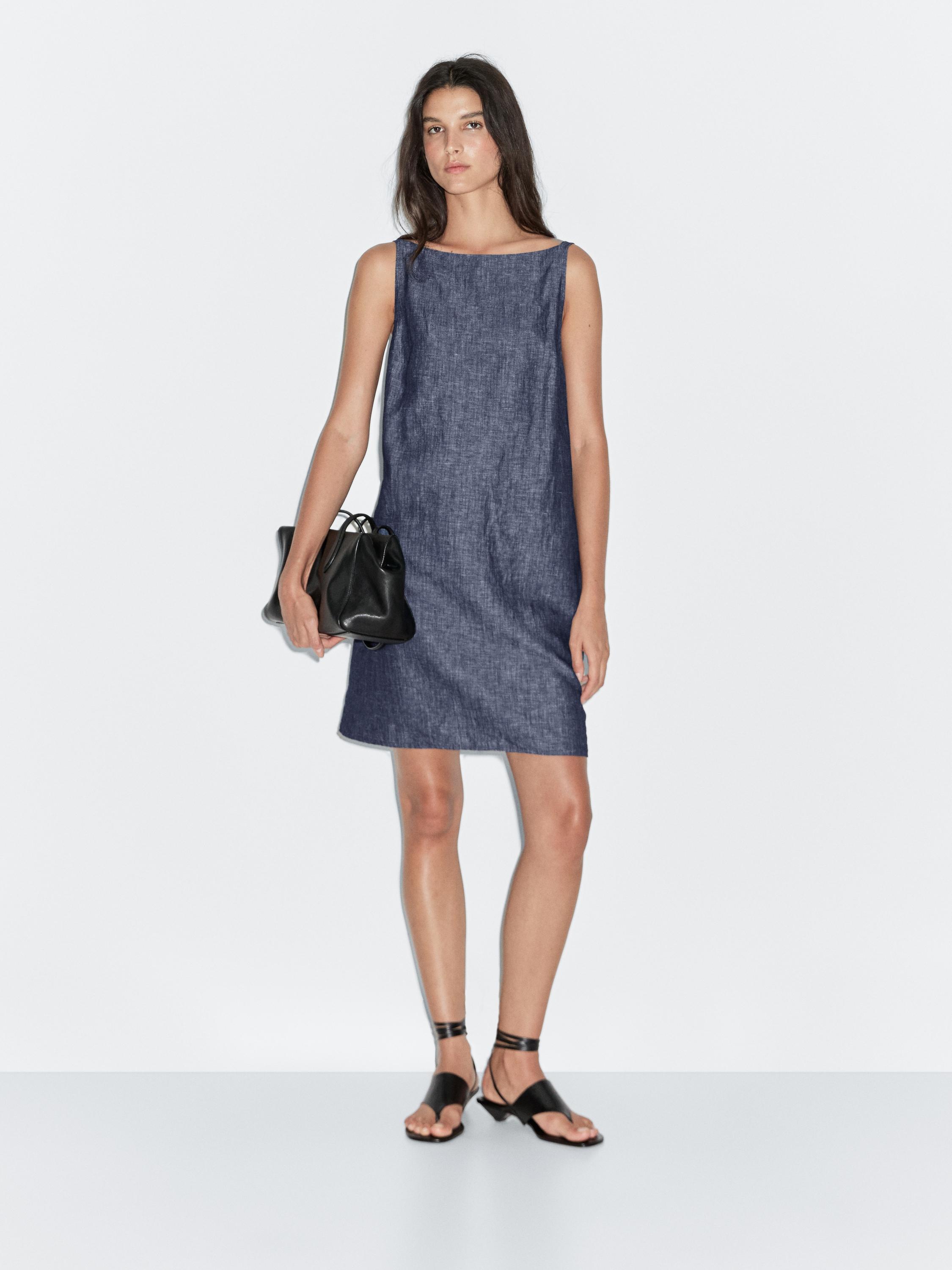 Gaun pendek dengan punggung potongan rendah