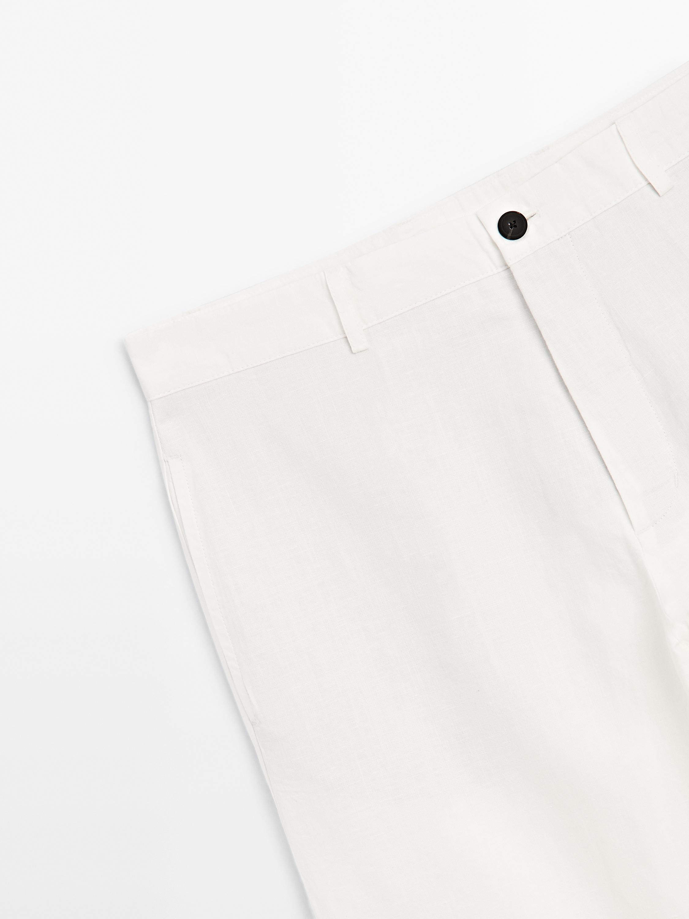 Tapered fit trousers
