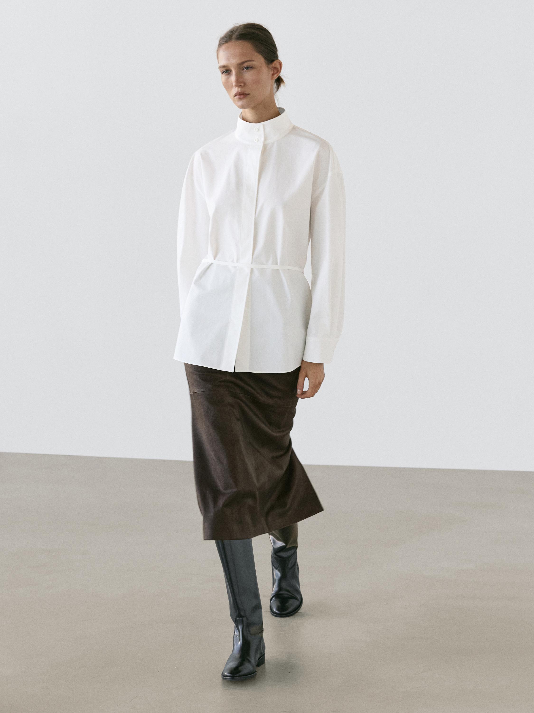 High neck shirt with strap detail