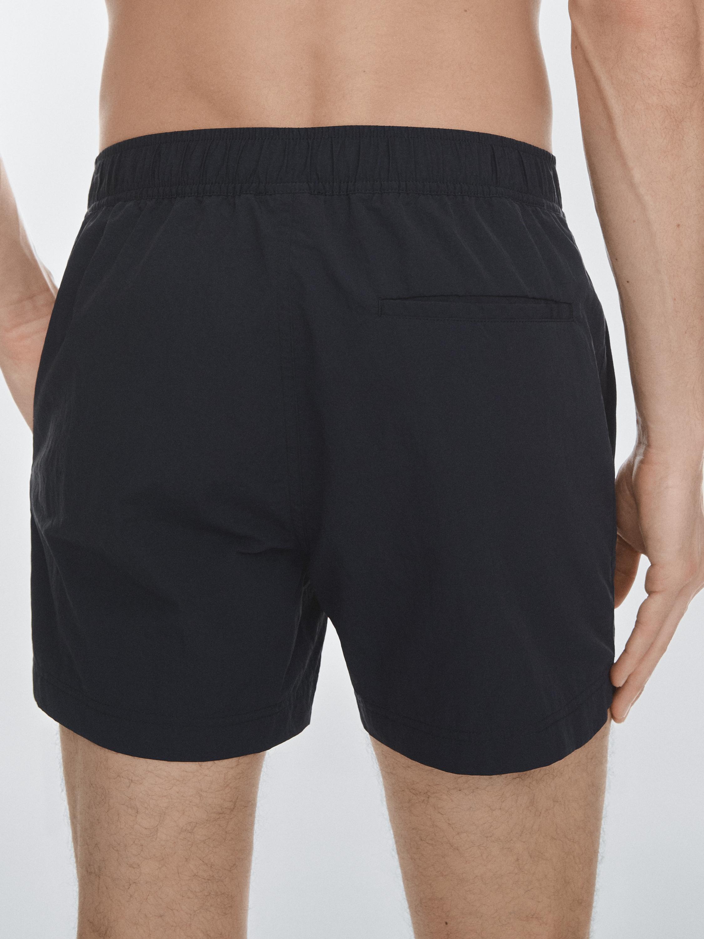 Plain swimming trunks with waist detail — NAVY BLUE