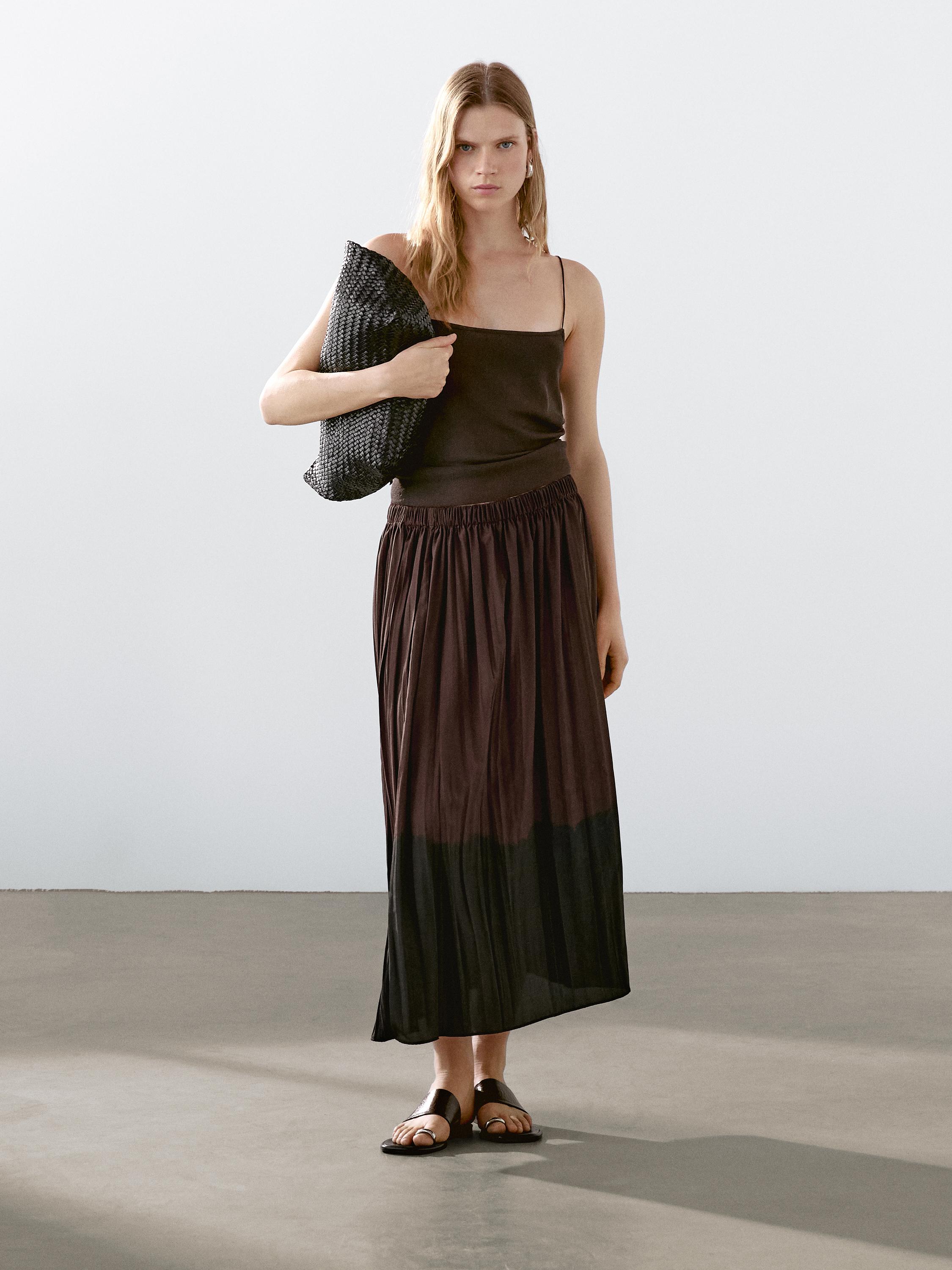 Long flowing pleated skirt