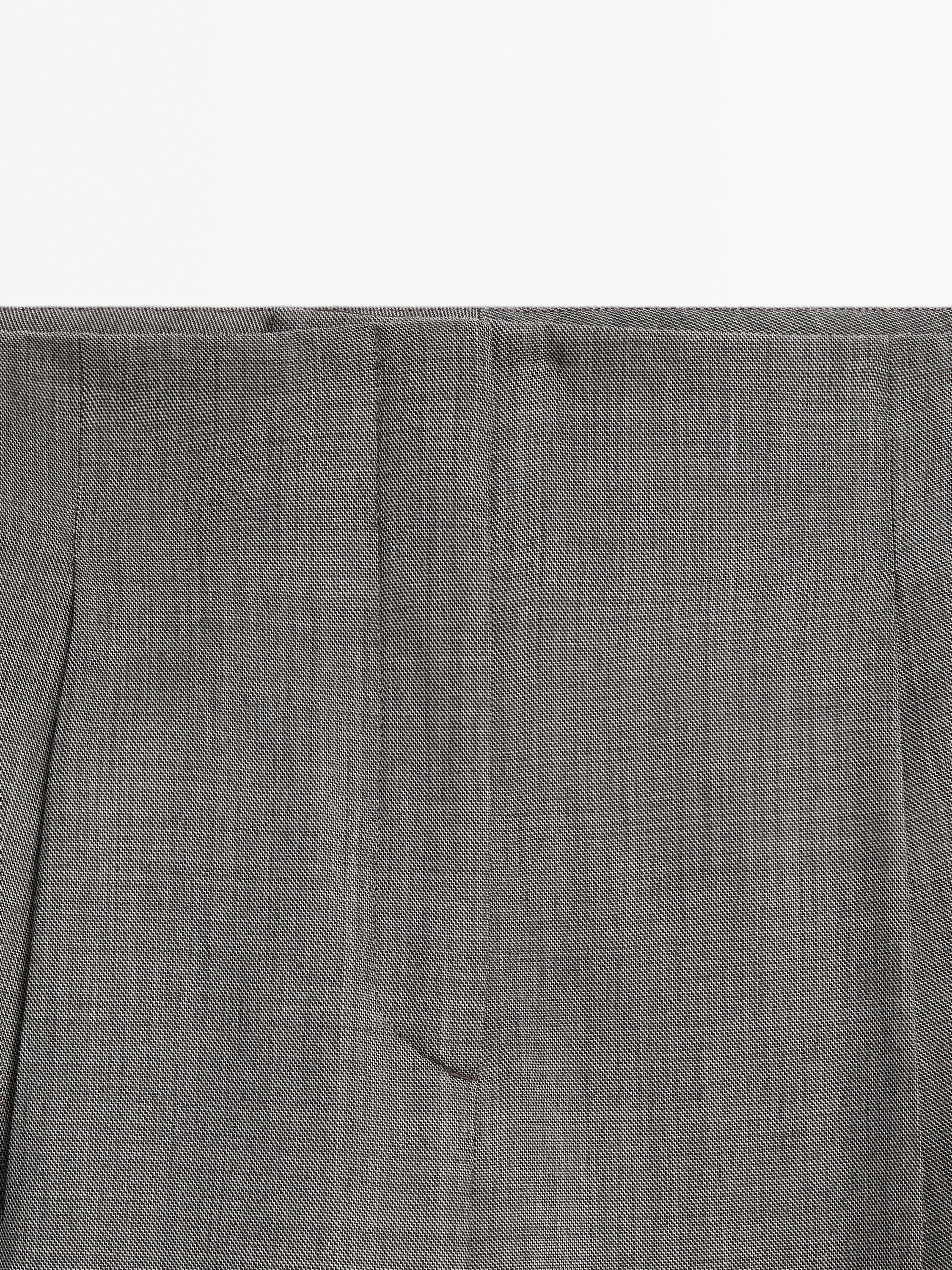Pantalon chiné plissé en laine mélangée