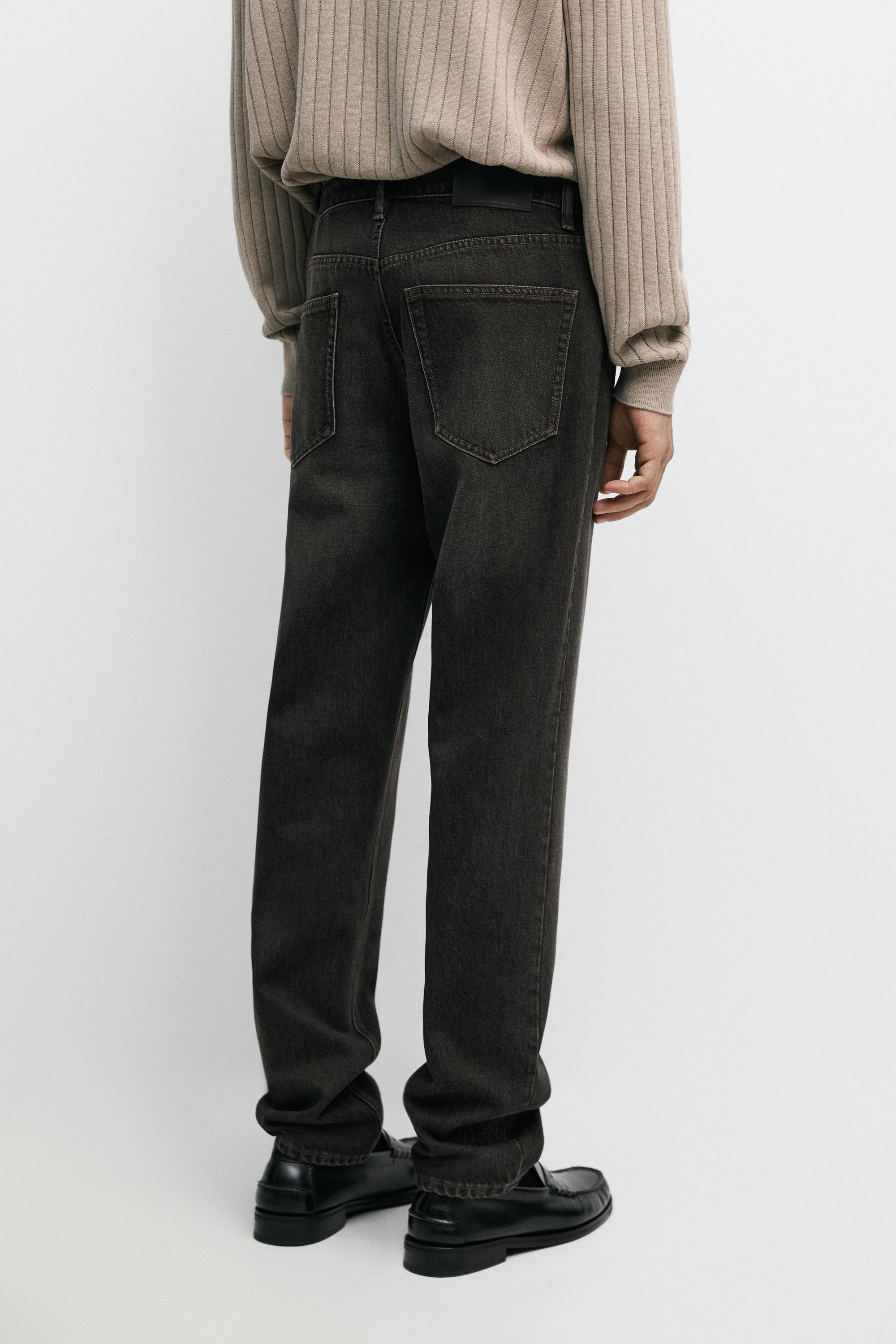Stonewashed tapered-fit jeans — GREY