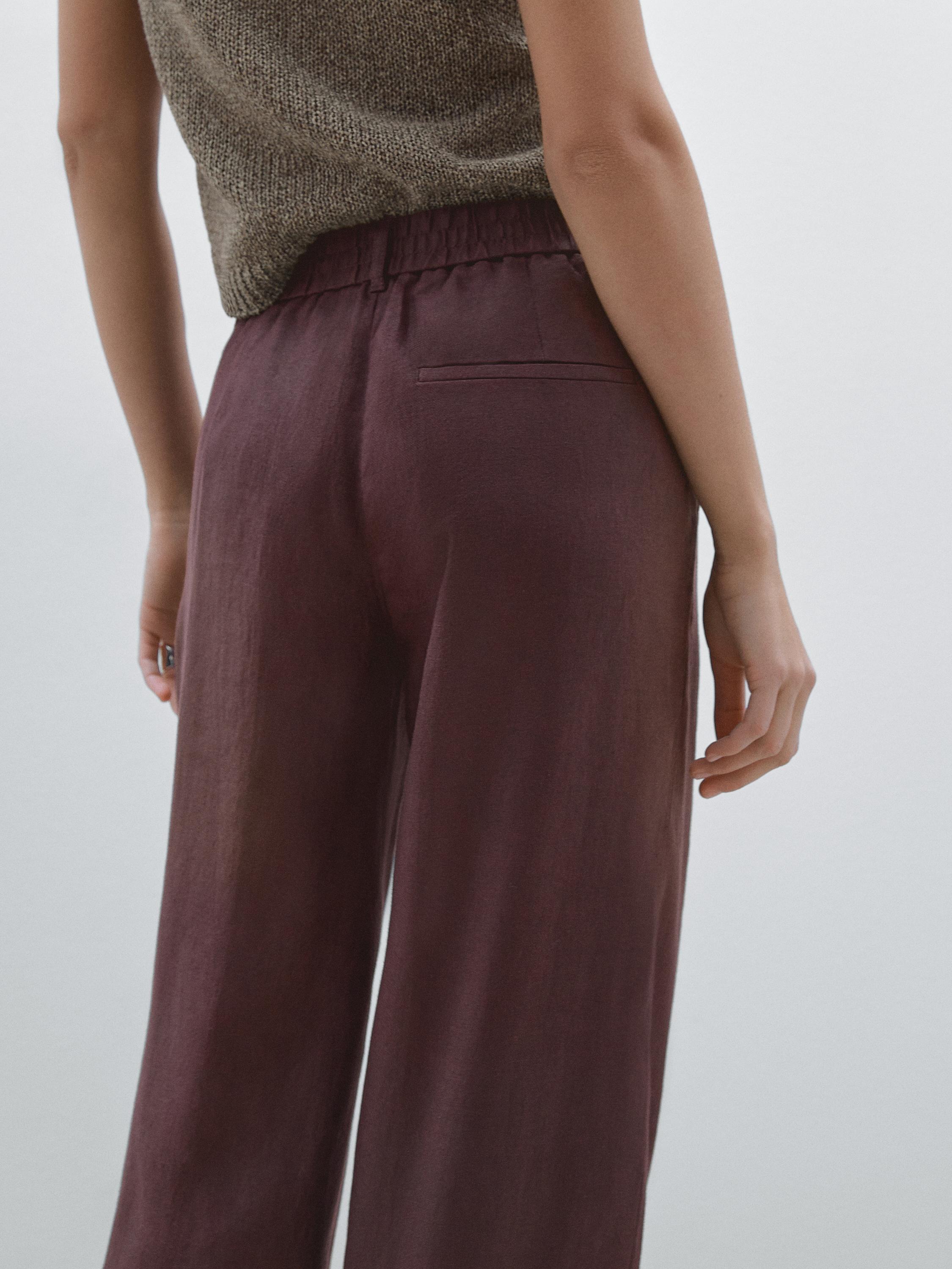 100% linen wide-leg elastic detail trousers