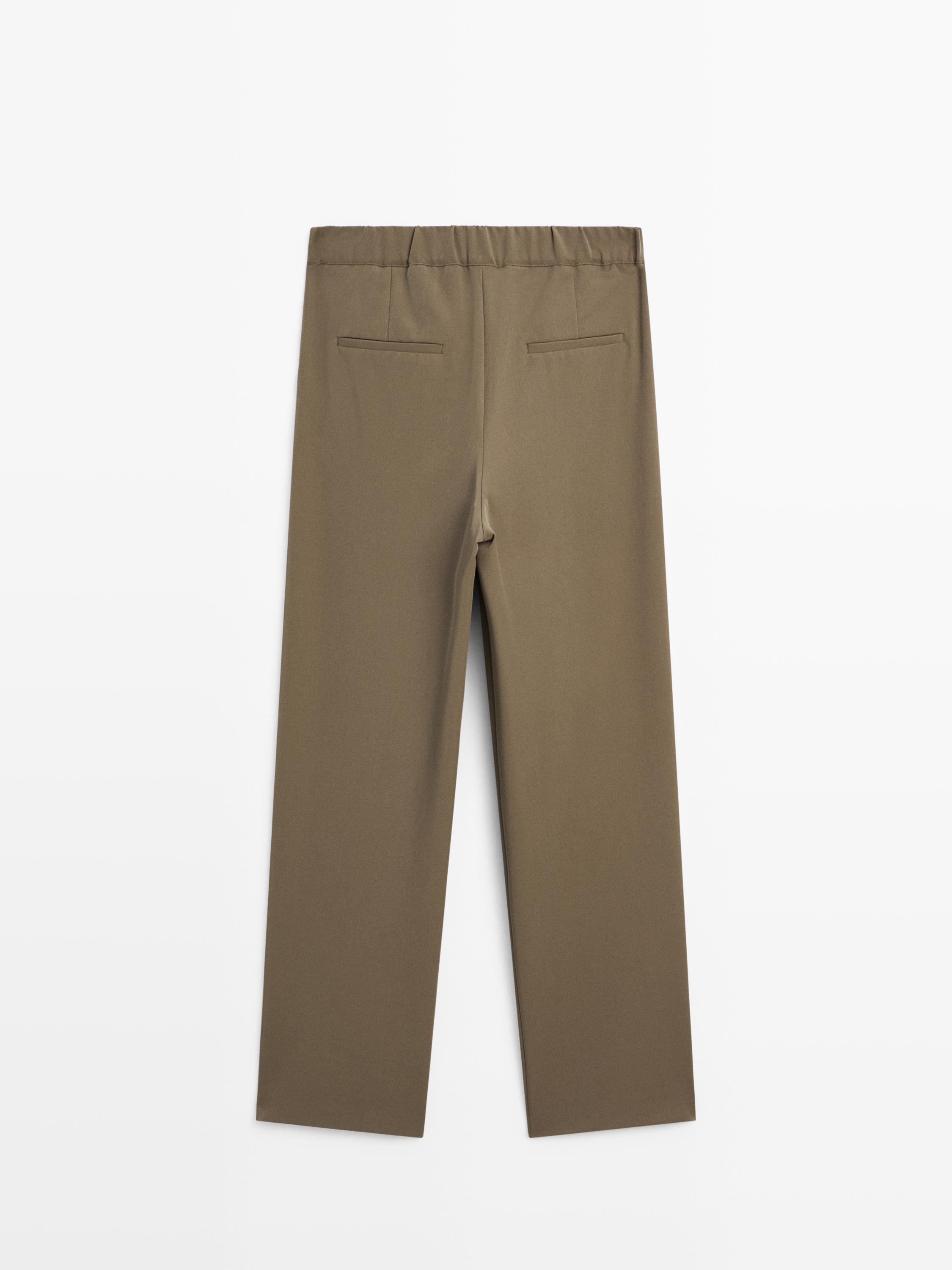Wide-leg flowing trousers with darts