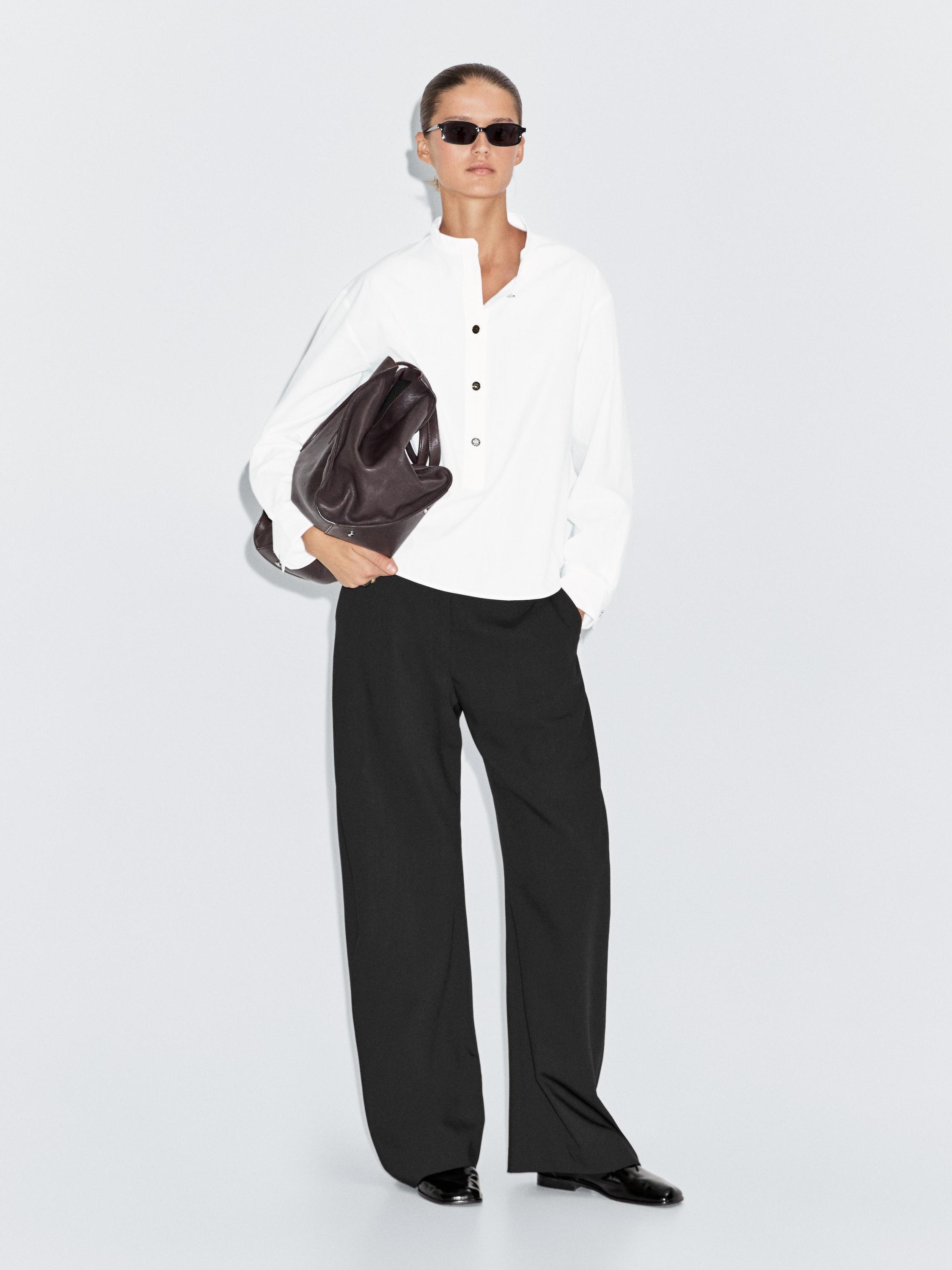 Camisa coll mao botons daurats