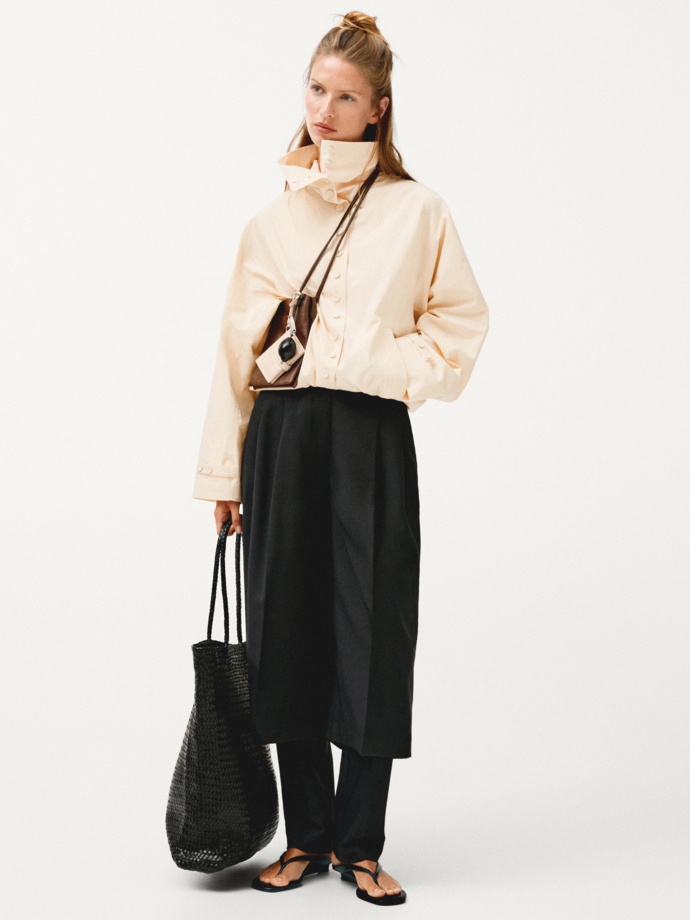 Casaco de algodão com pormenor de botões