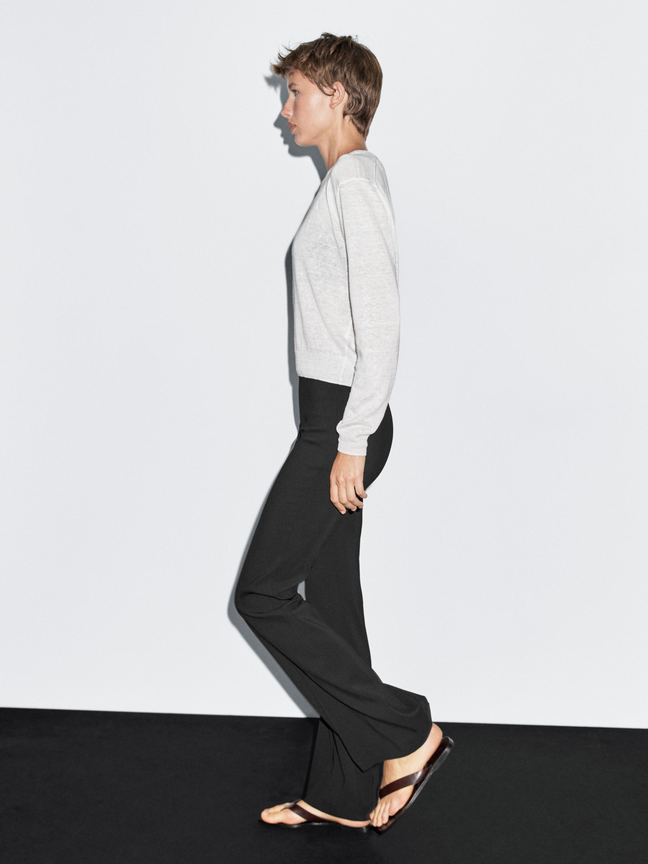 Flared trousers with pocket — BLACK