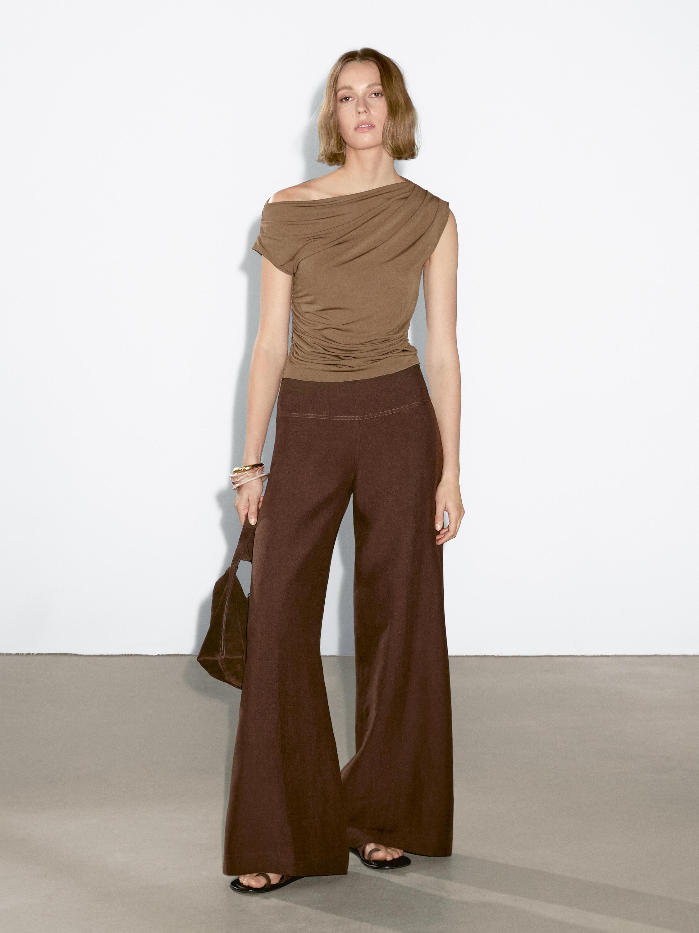Asymmetric top with draped detail