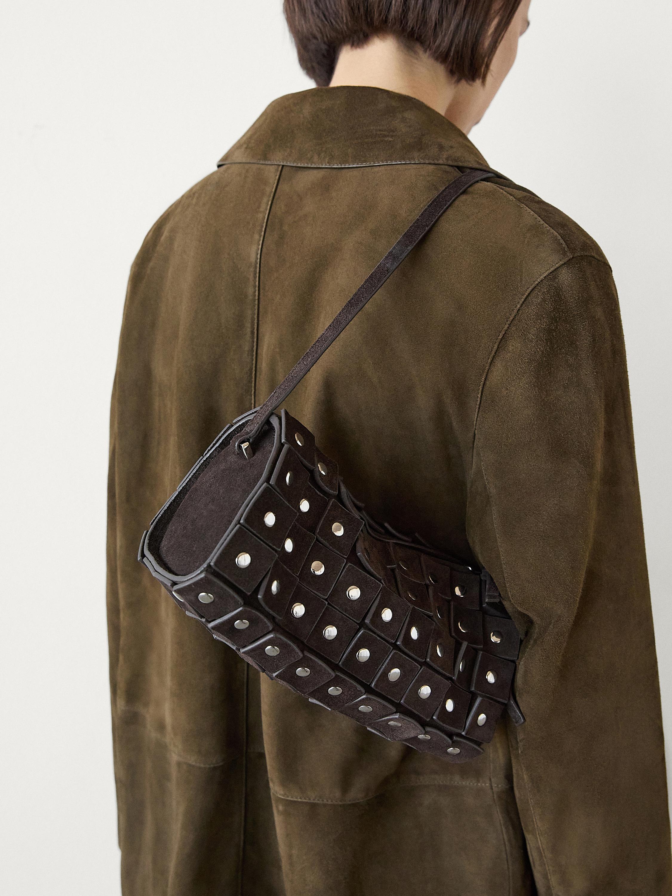 Studded split suede barrel bag