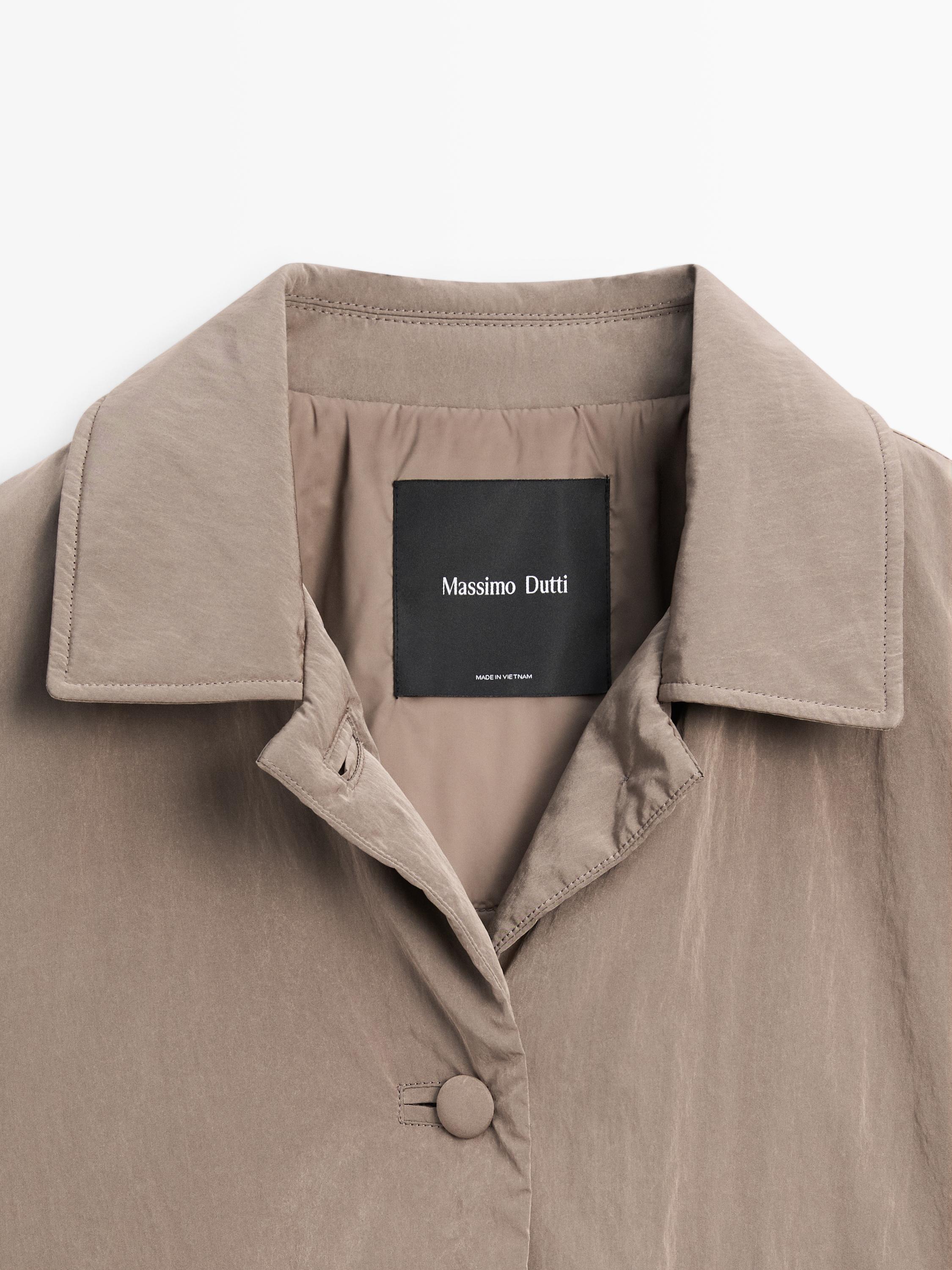 Cropped puffer jacket with covered buttons