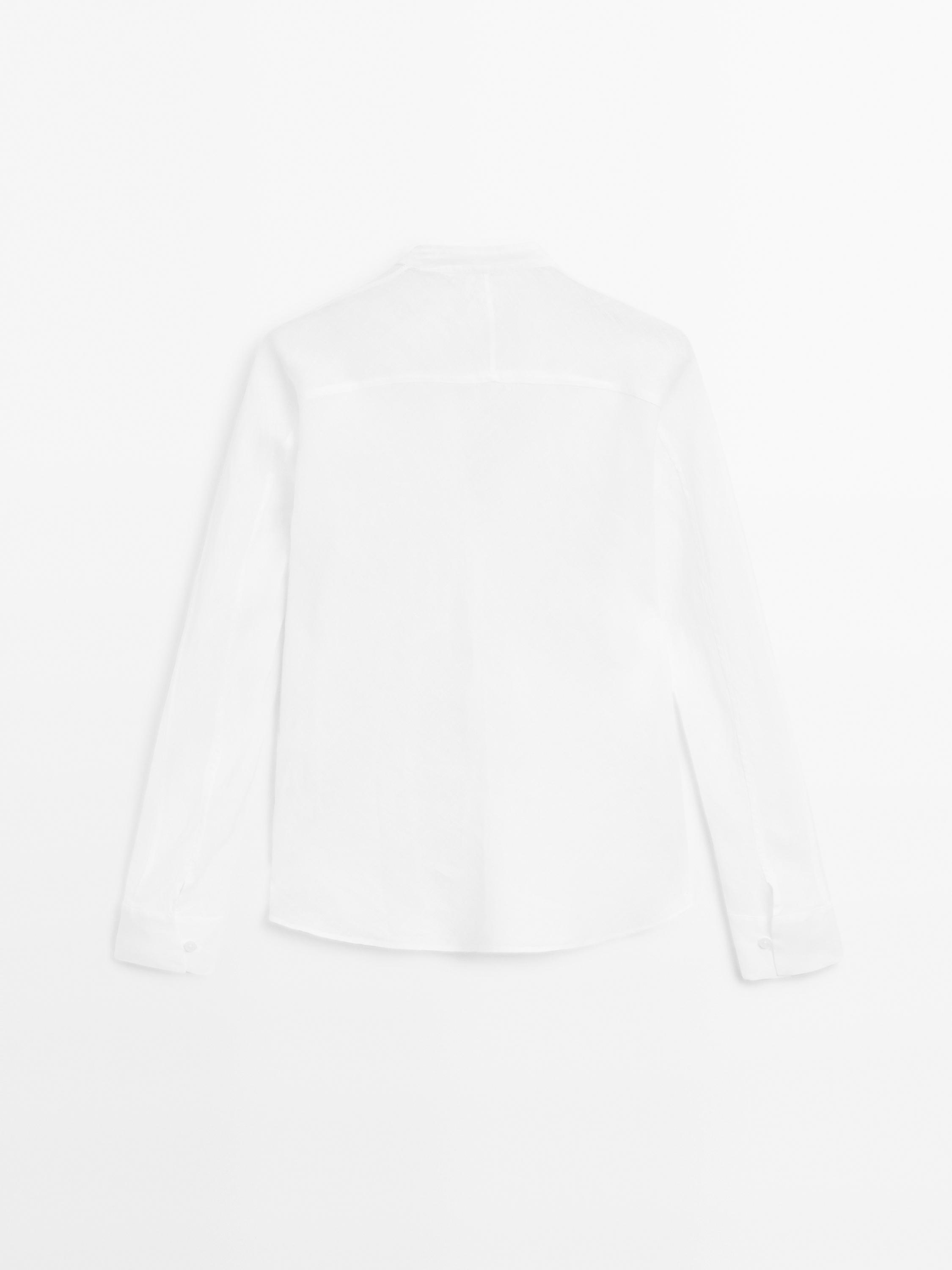 Flowing linen shirt with stand collar