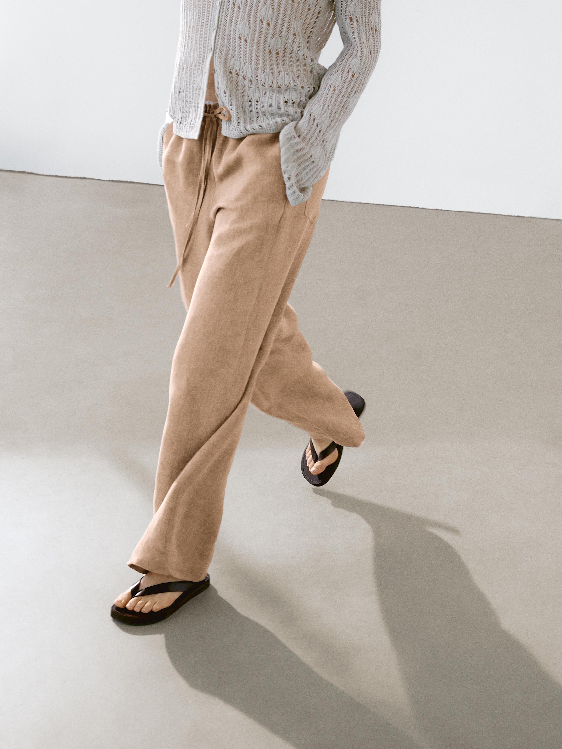 Linen suit trousers with frayed detail
