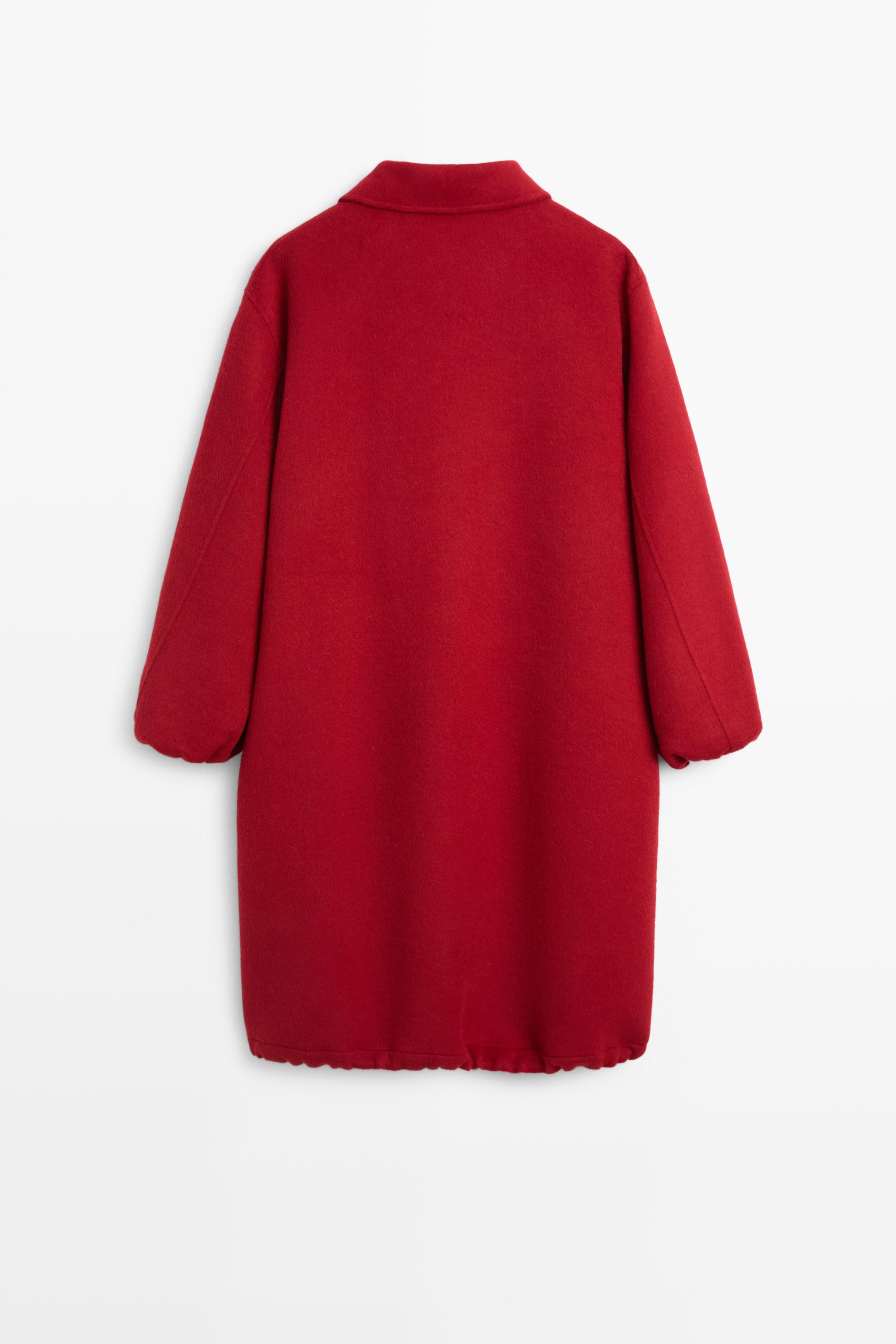 Long coat with asymmetrical collar detail